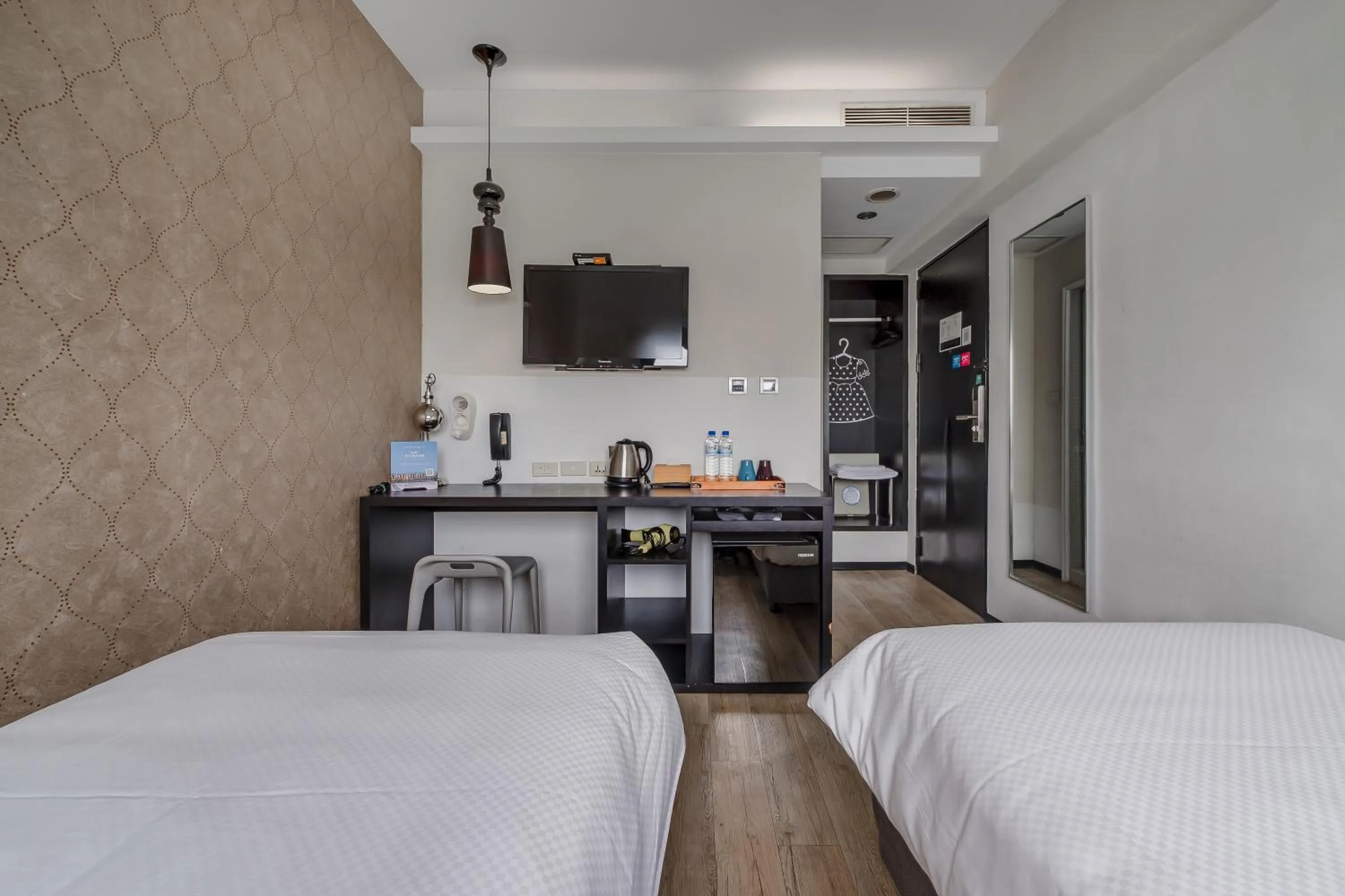 Bed in CHECK inn Express Kaohsiung Love River