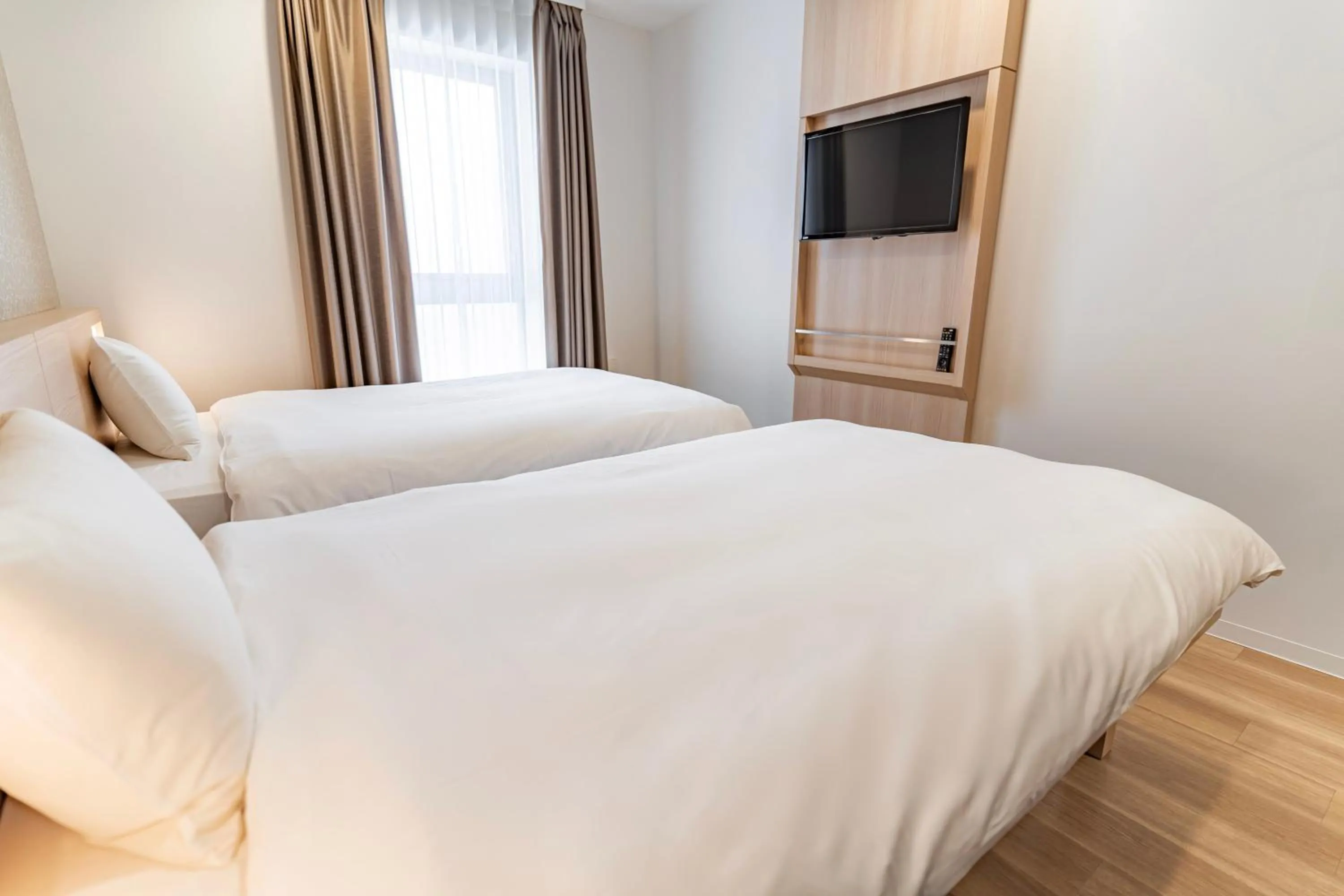 Bed in Kansai International Airport Hotel 11