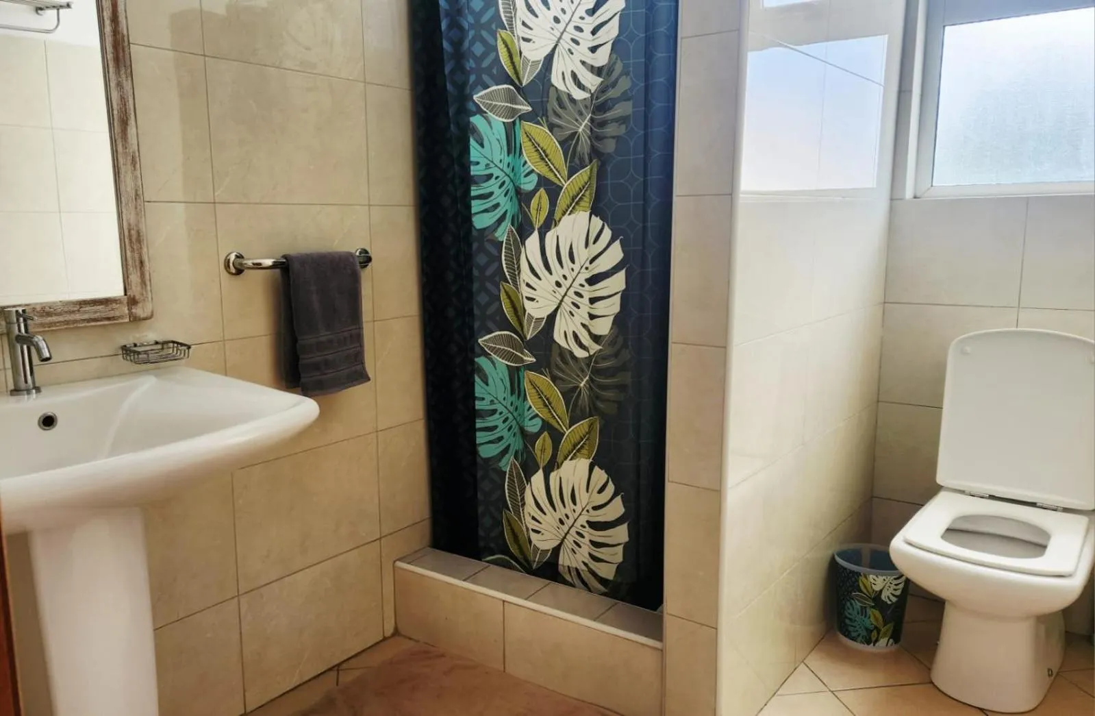 Toilet in La Perla Holiday Apartments