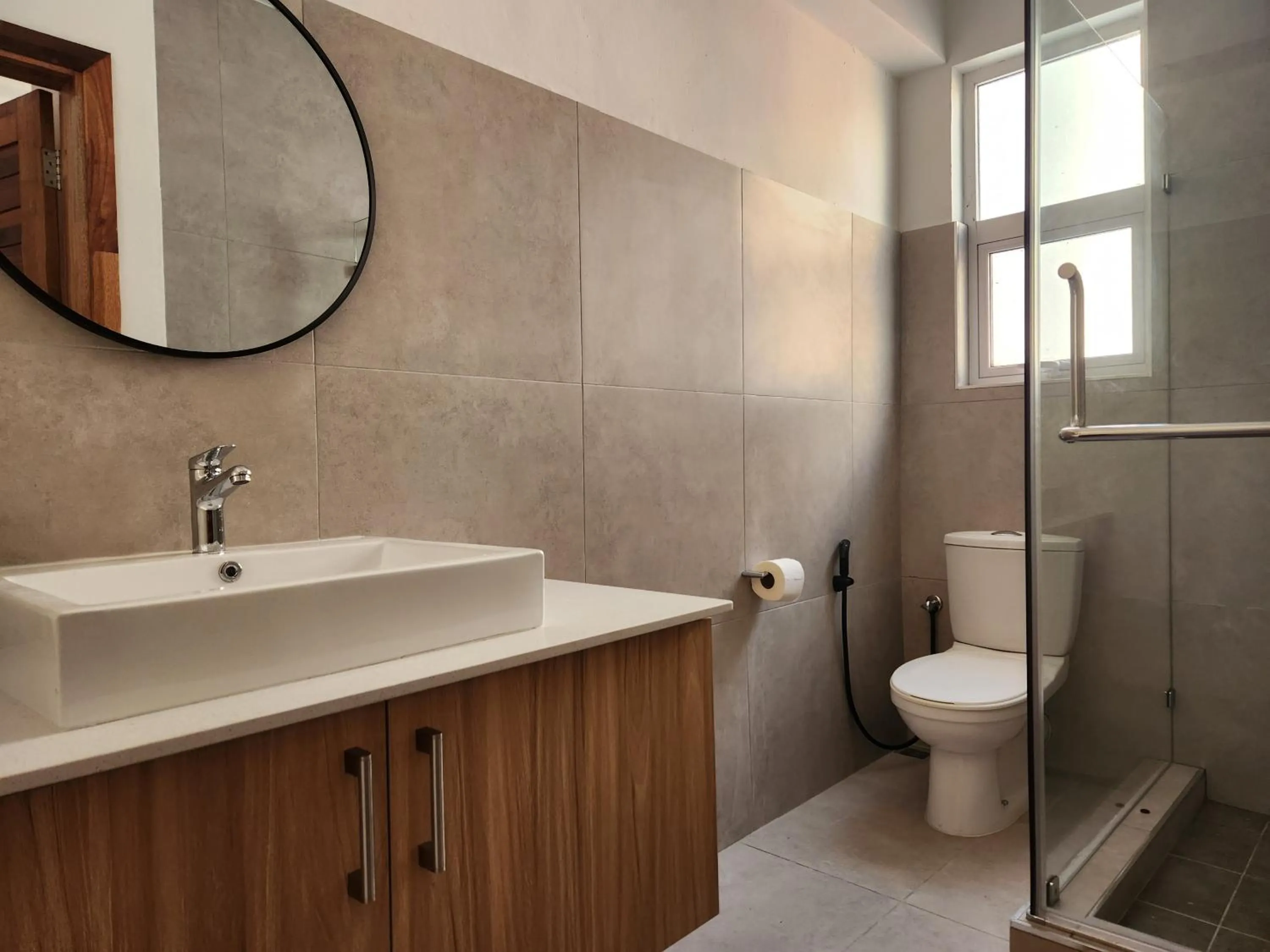 Shower in La Perla Holiday Apartments