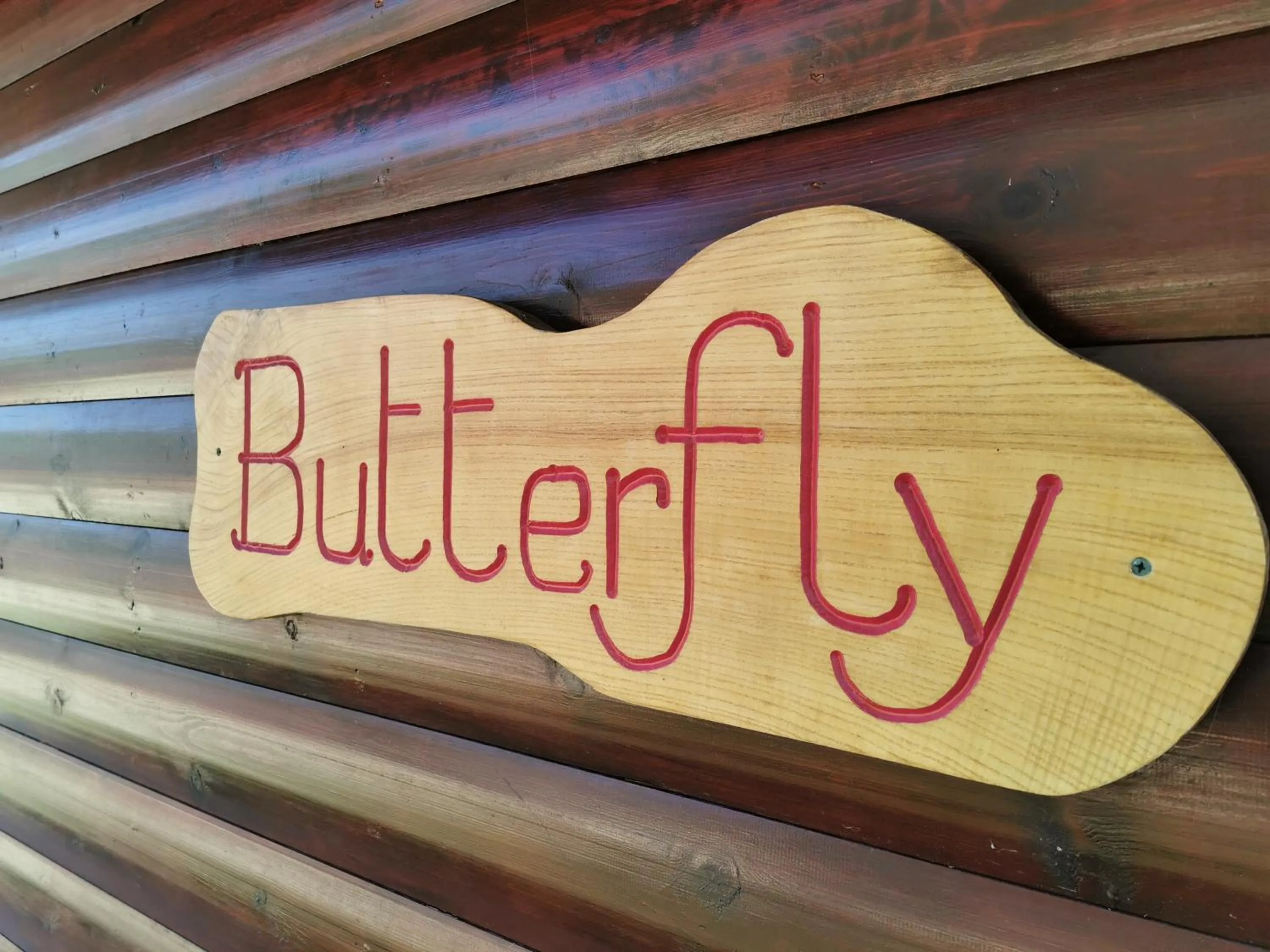Property logo or sign in Wall Eden Farm - Luxury Log Cabins and Glamping