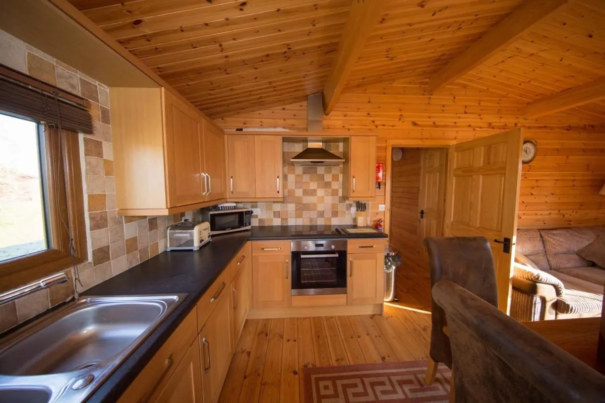 Kitchen or kitchenette in Wall Eden Farm - Luxury Log Cabins and Glamping