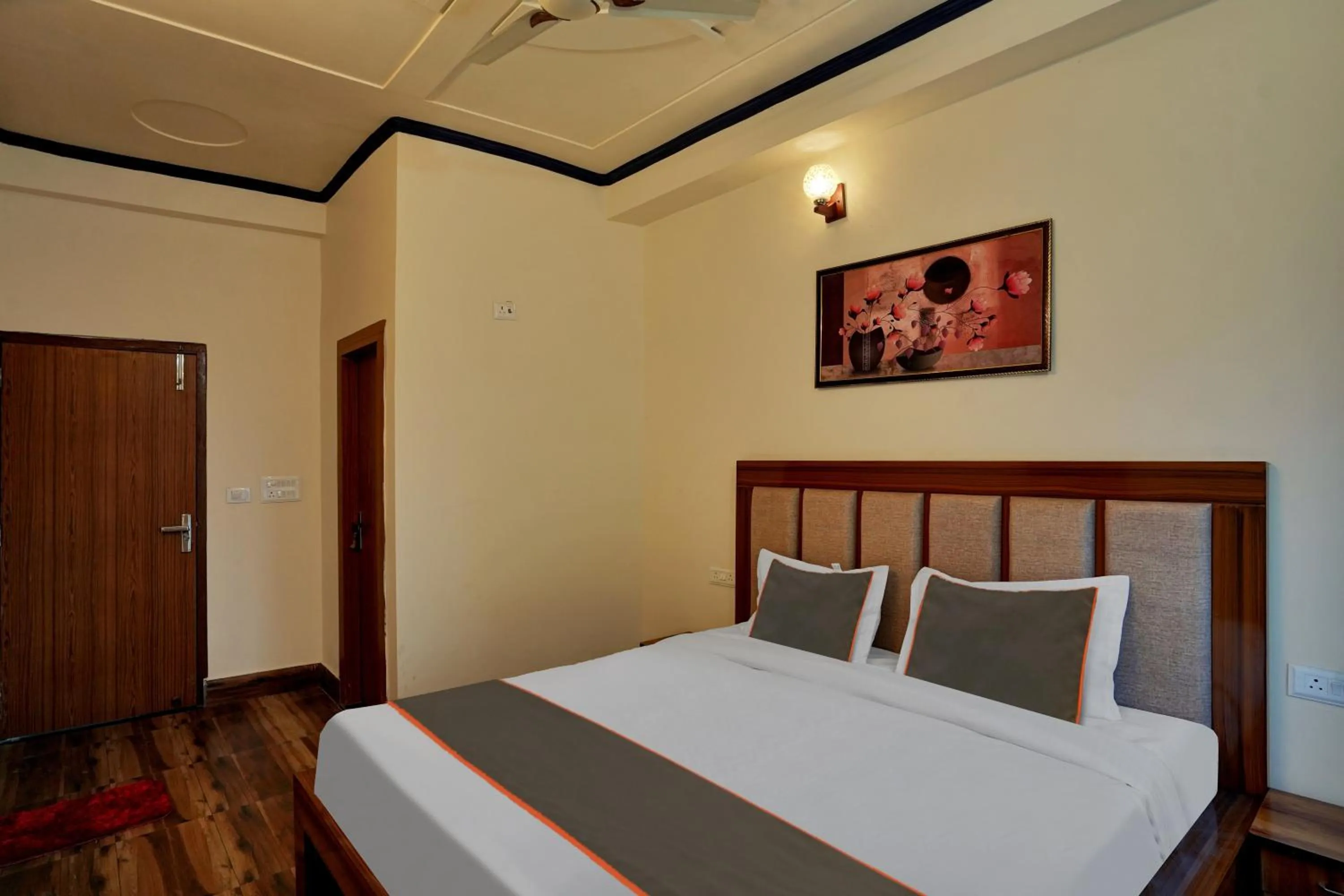 Bedroom in Collection O Trihans Mantion Hotel