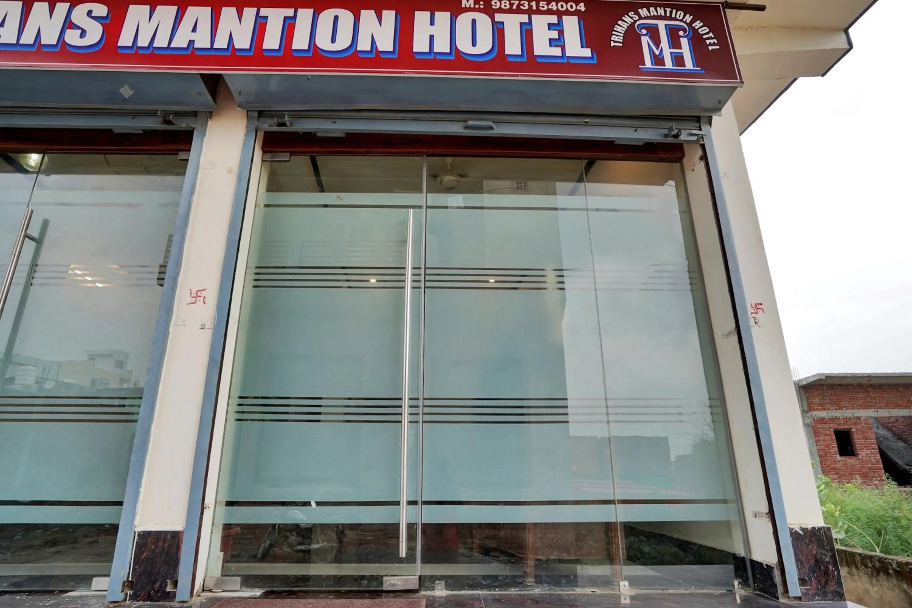 Facade/entrance in Collection O Trihans Mantion Hotel