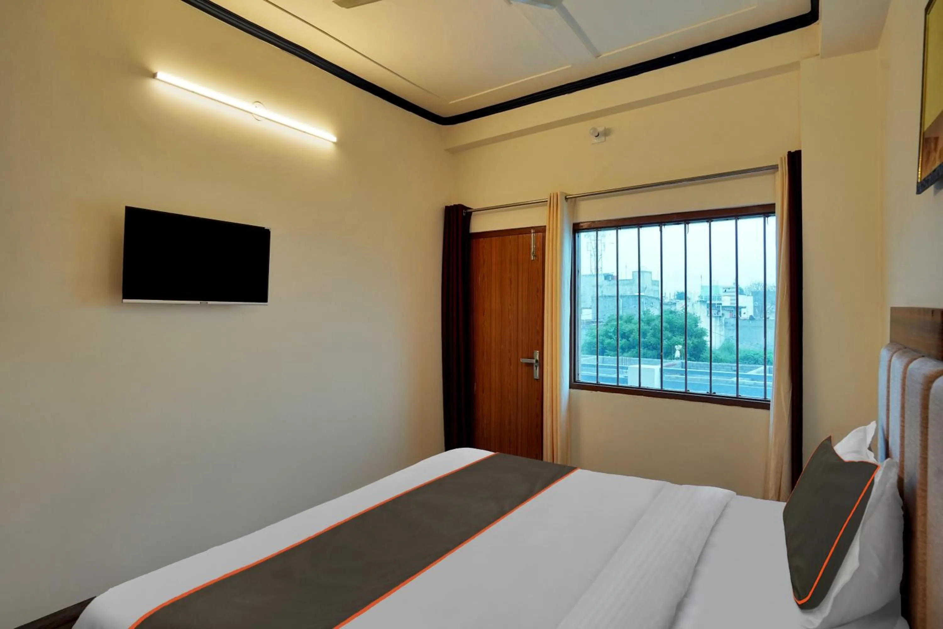 Bedroom in Collection O Trihans Mantion Hotel