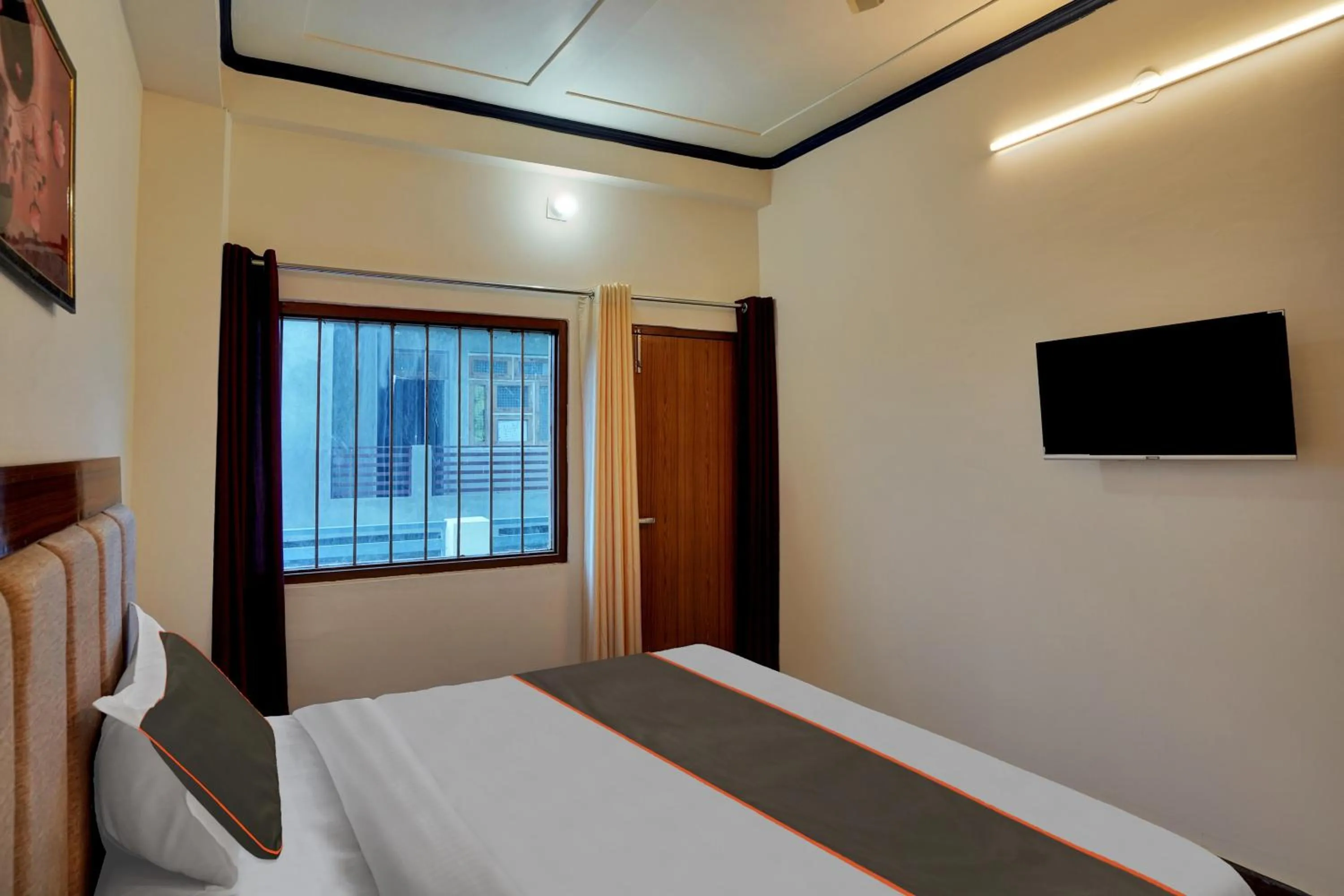 Bedroom in Collection O Trihans Mantion Hotel