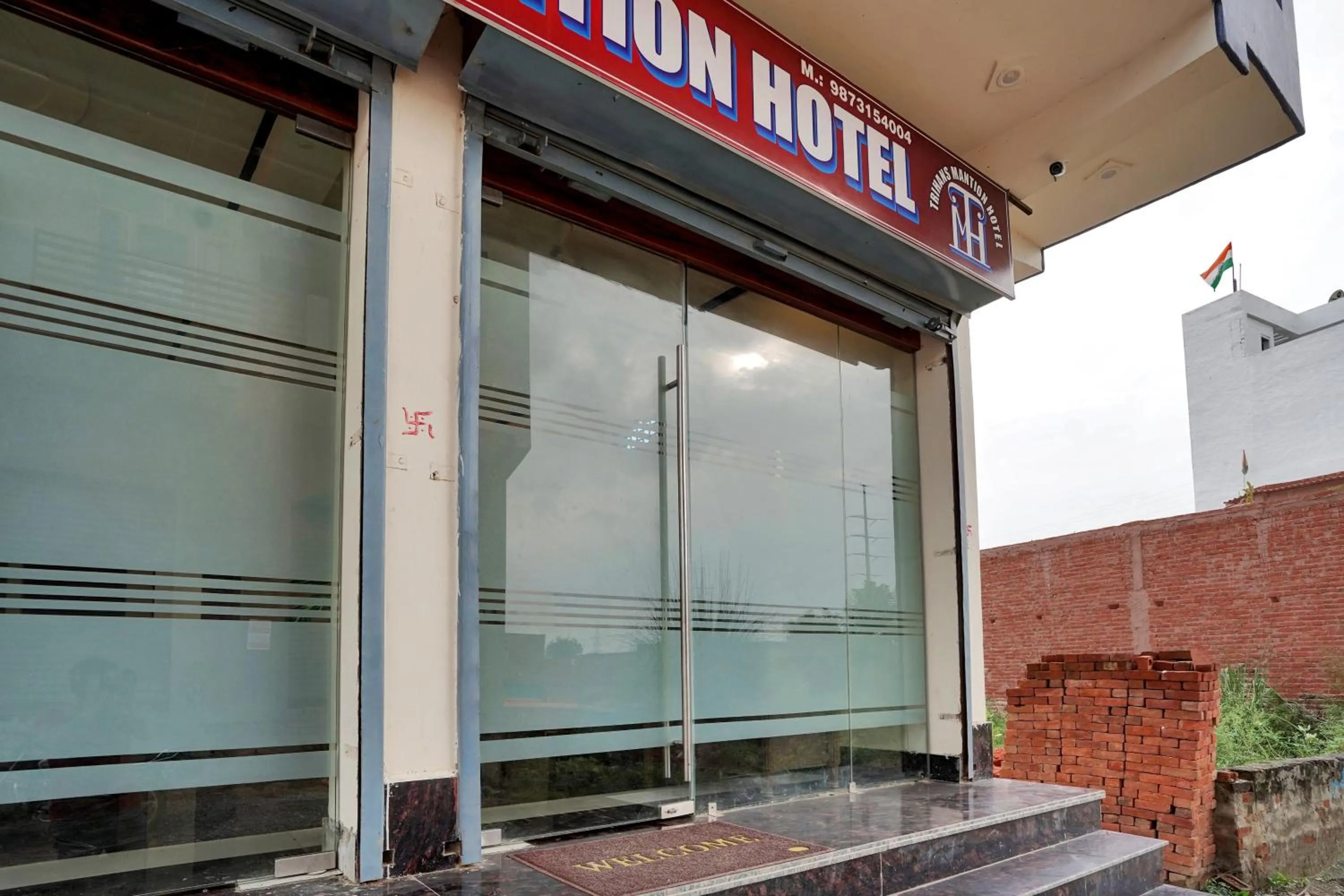 Facade/entrance in Collection O Trihans Mantion Hotel