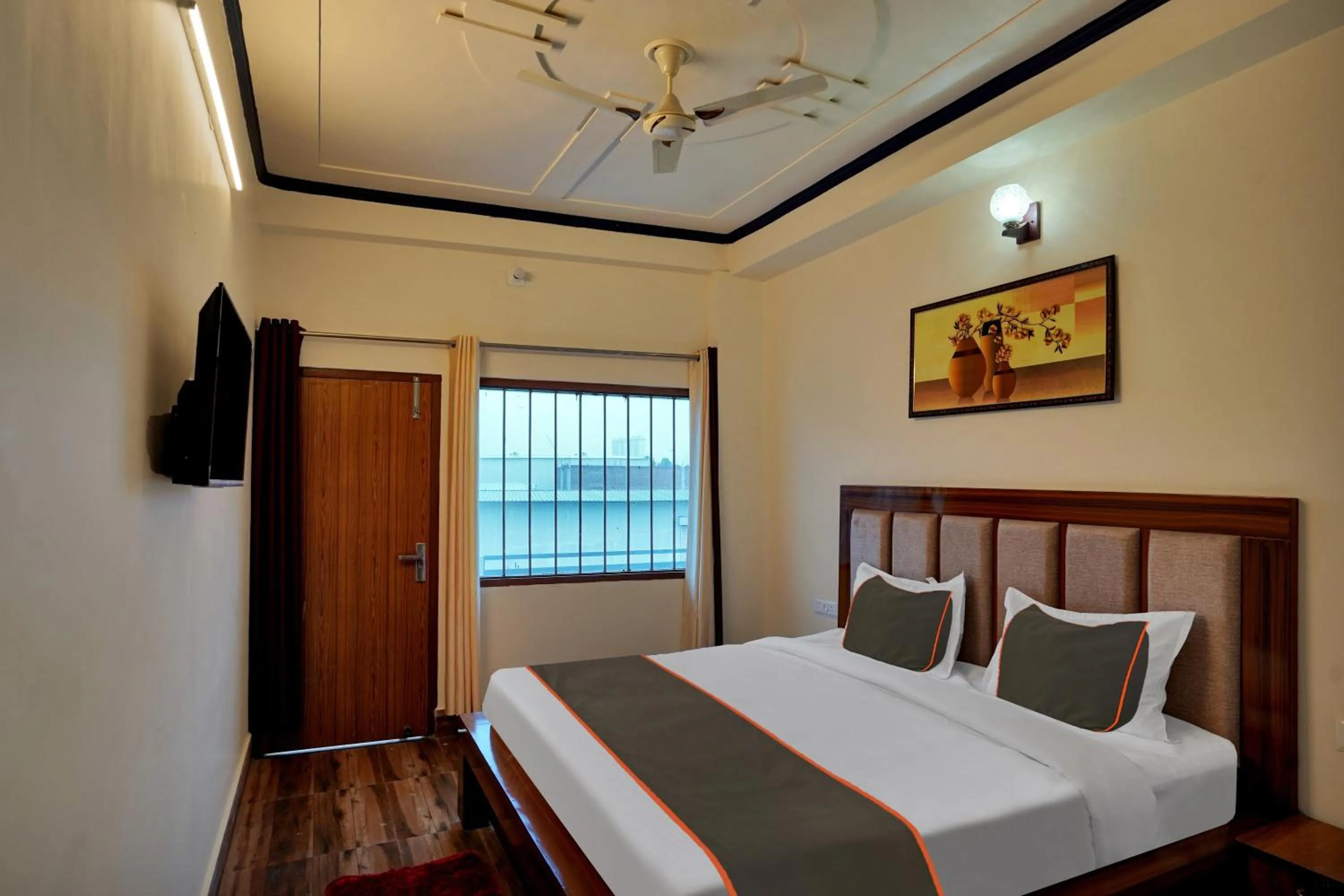 Bedroom in Collection O Trihans Mantion Hotel