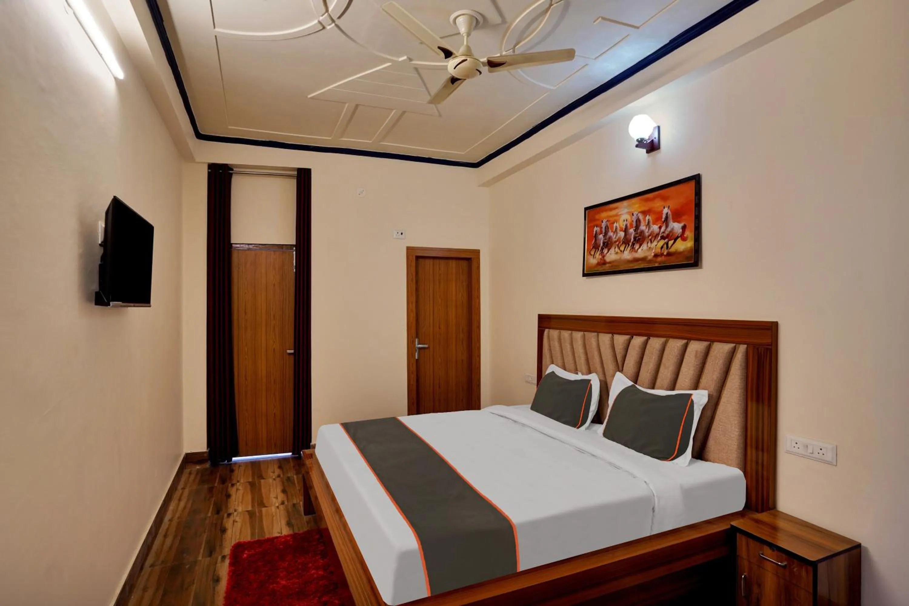 Bedroom in Collection O Trihans Mantion Hotel