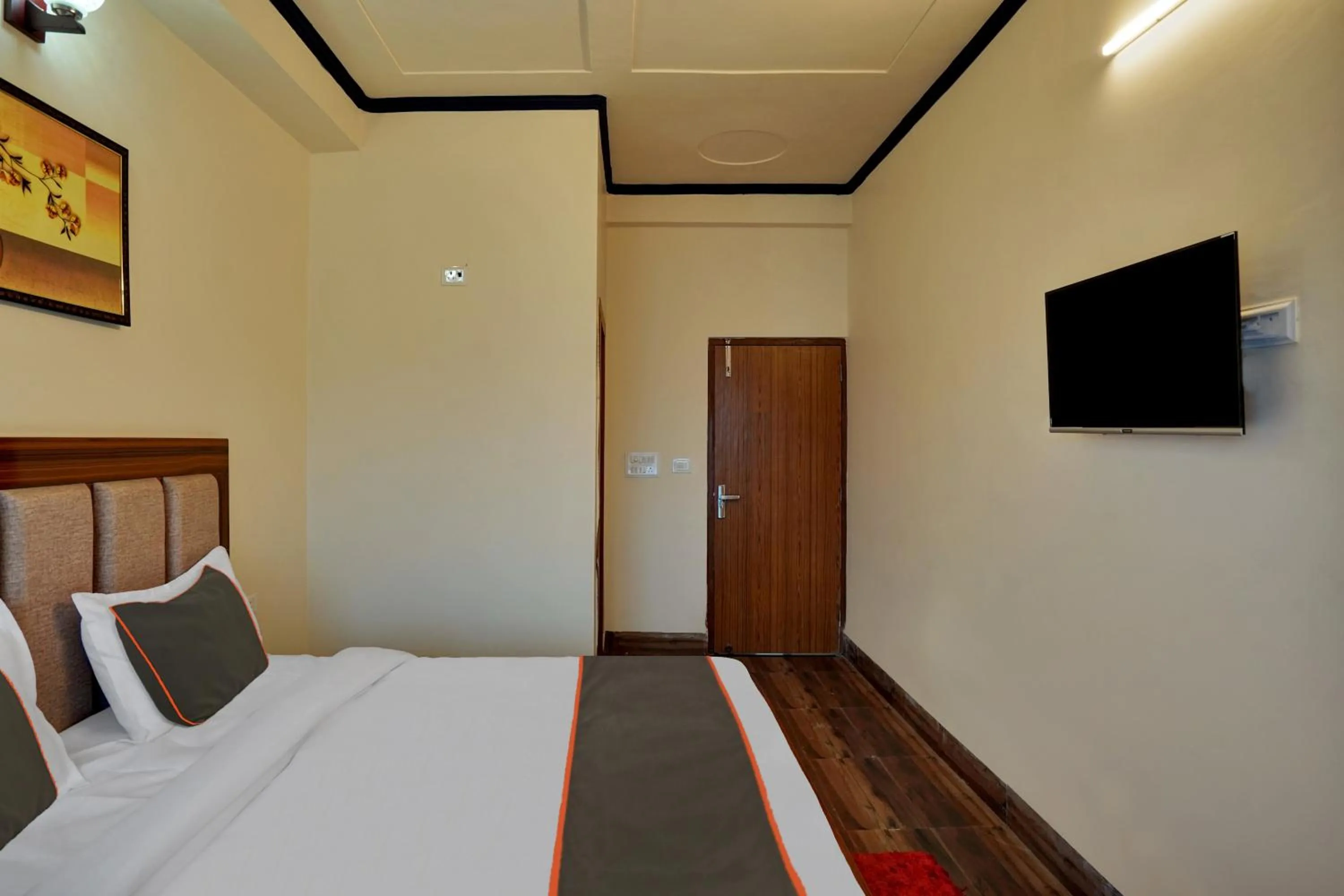 Bedroom in Collection O Trihans Mantion Hotel