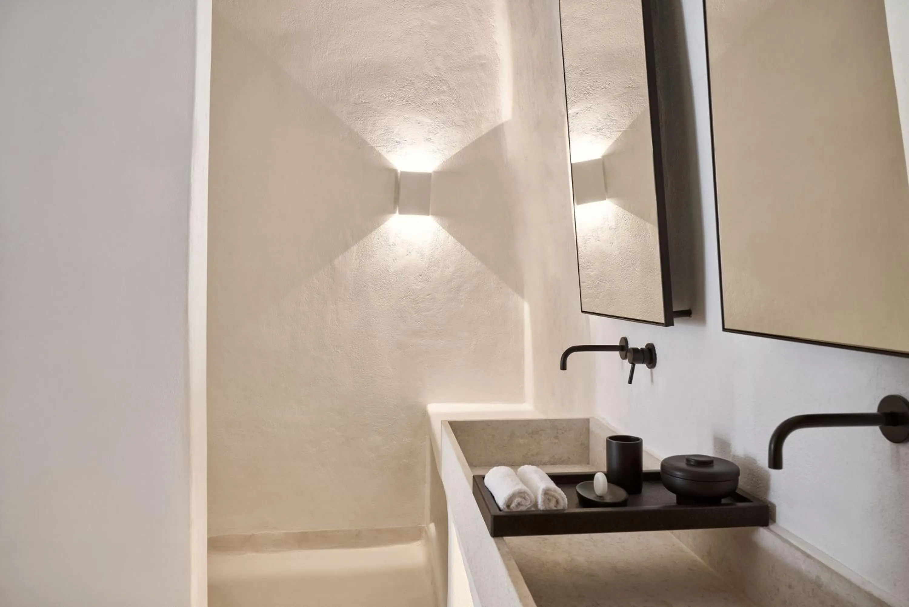 Bathroom in Charisma Suites