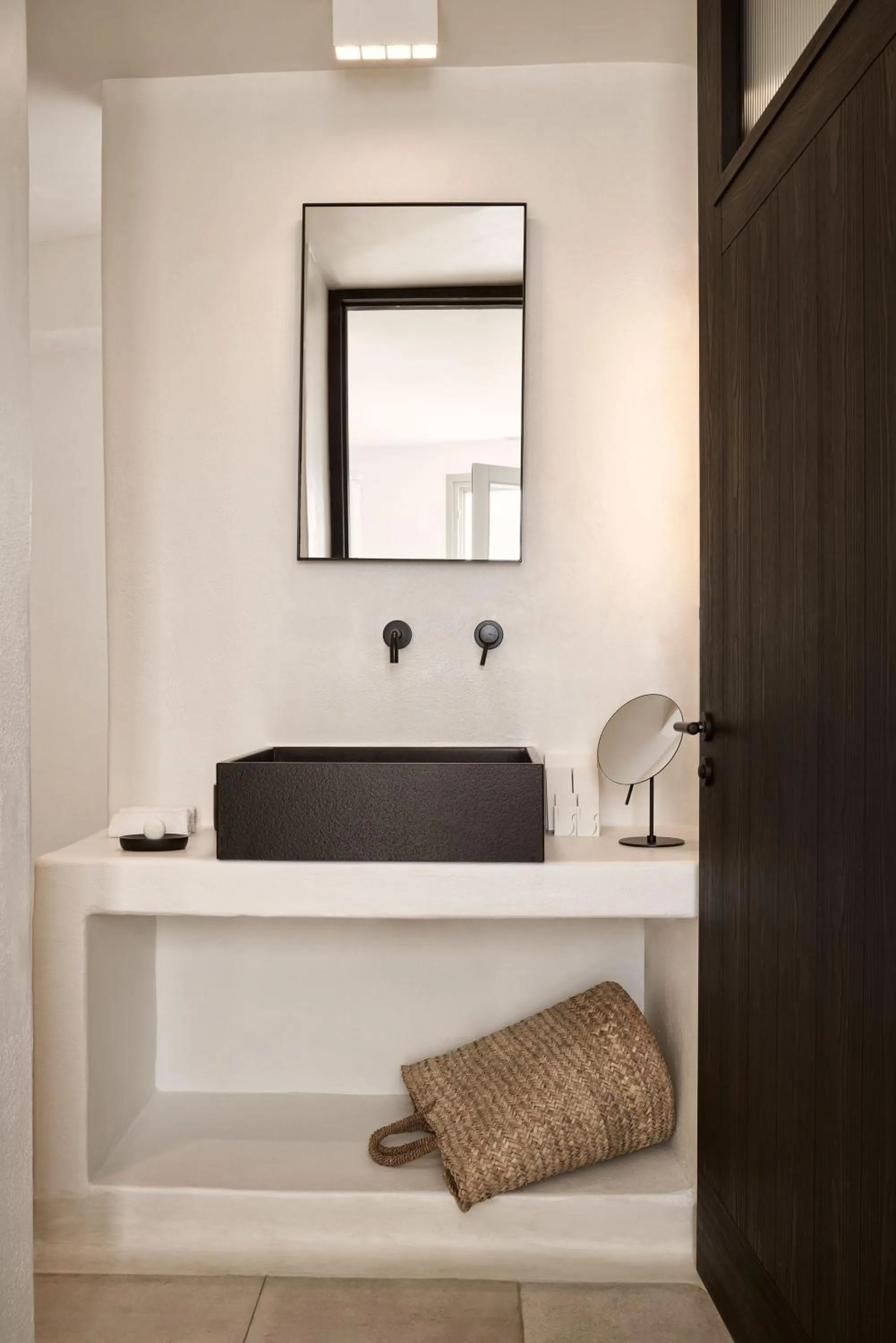 Bathroom in Charisma Suites