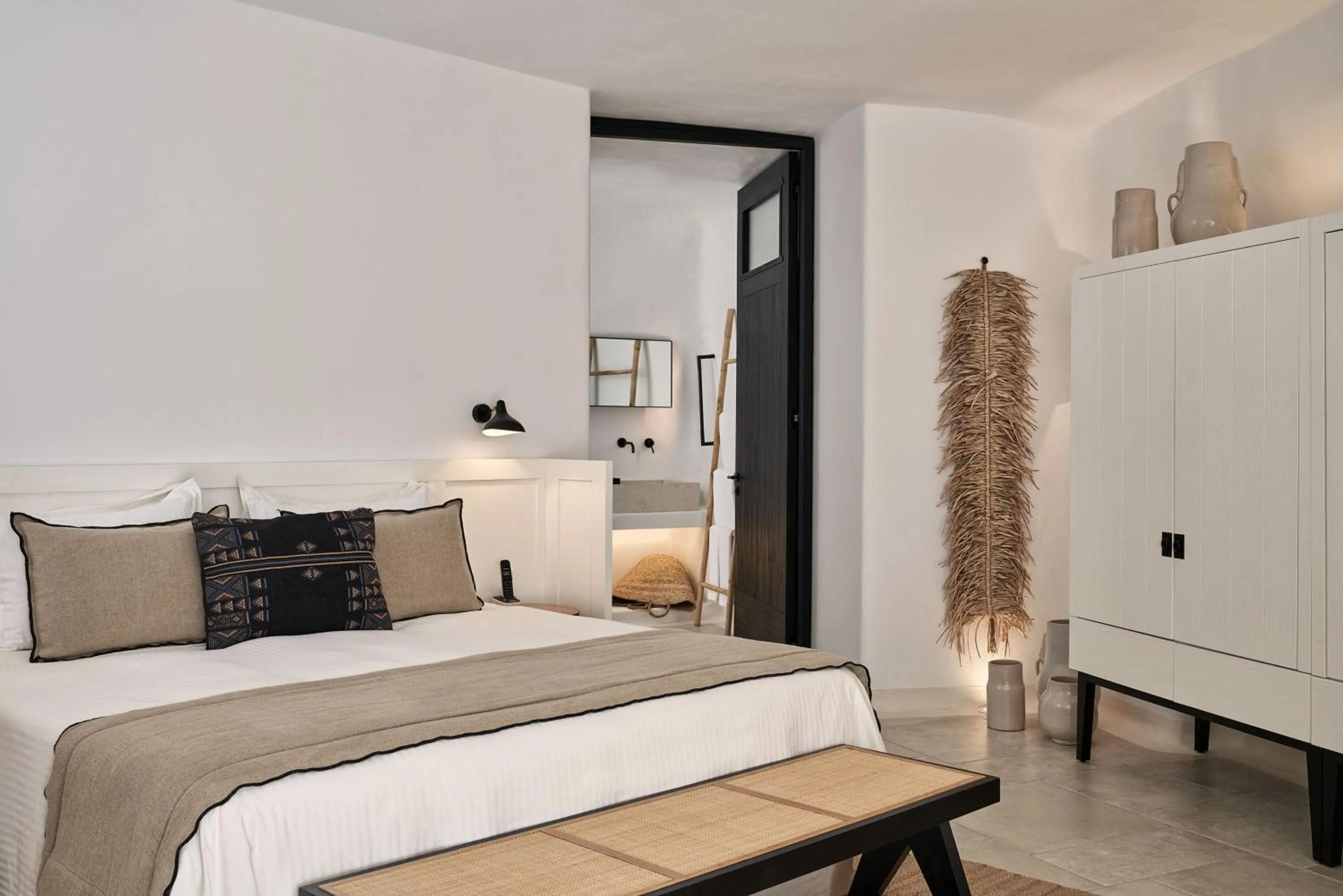 Bed in Charisma Suites