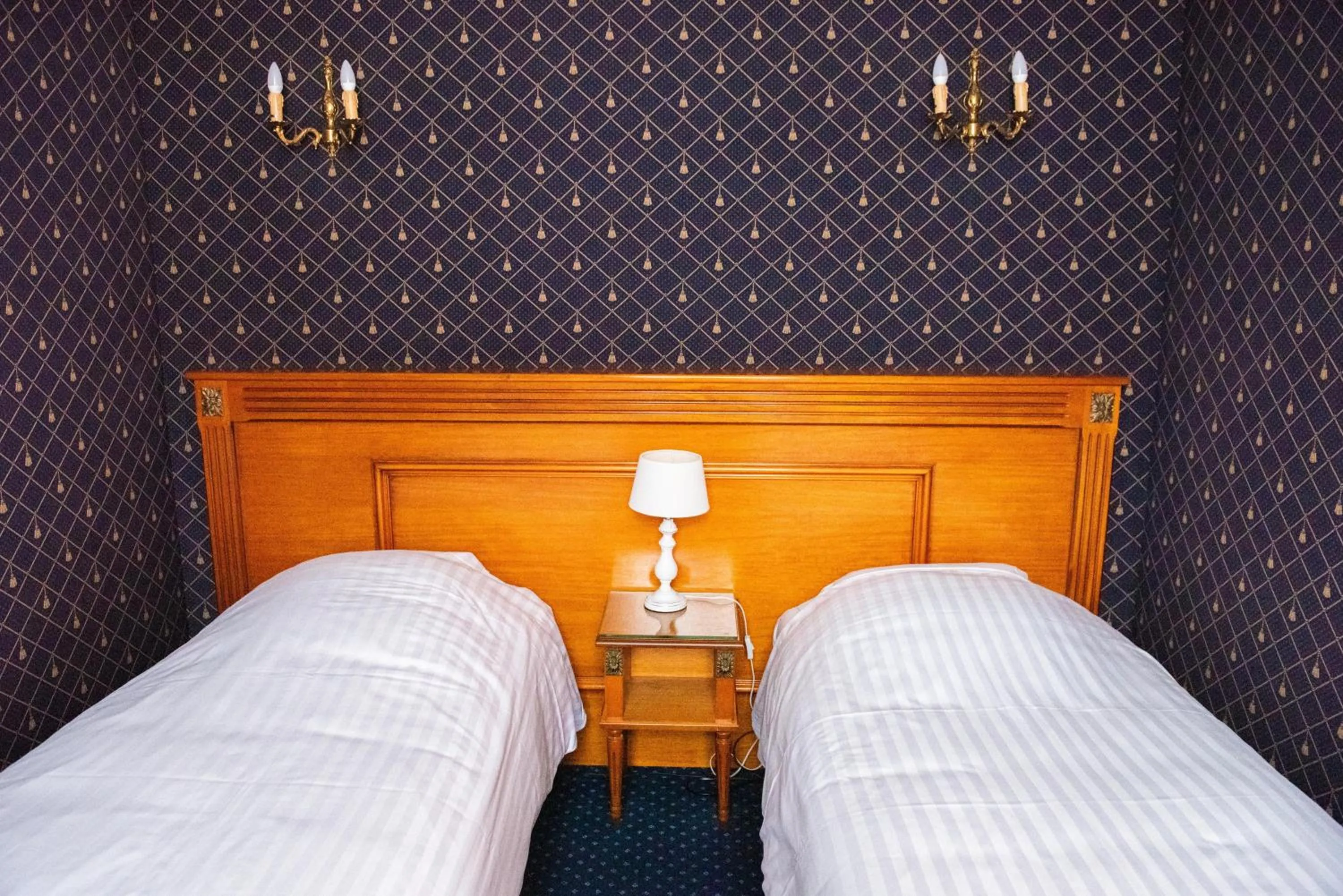 Bed in Hôtel Jolly Roger