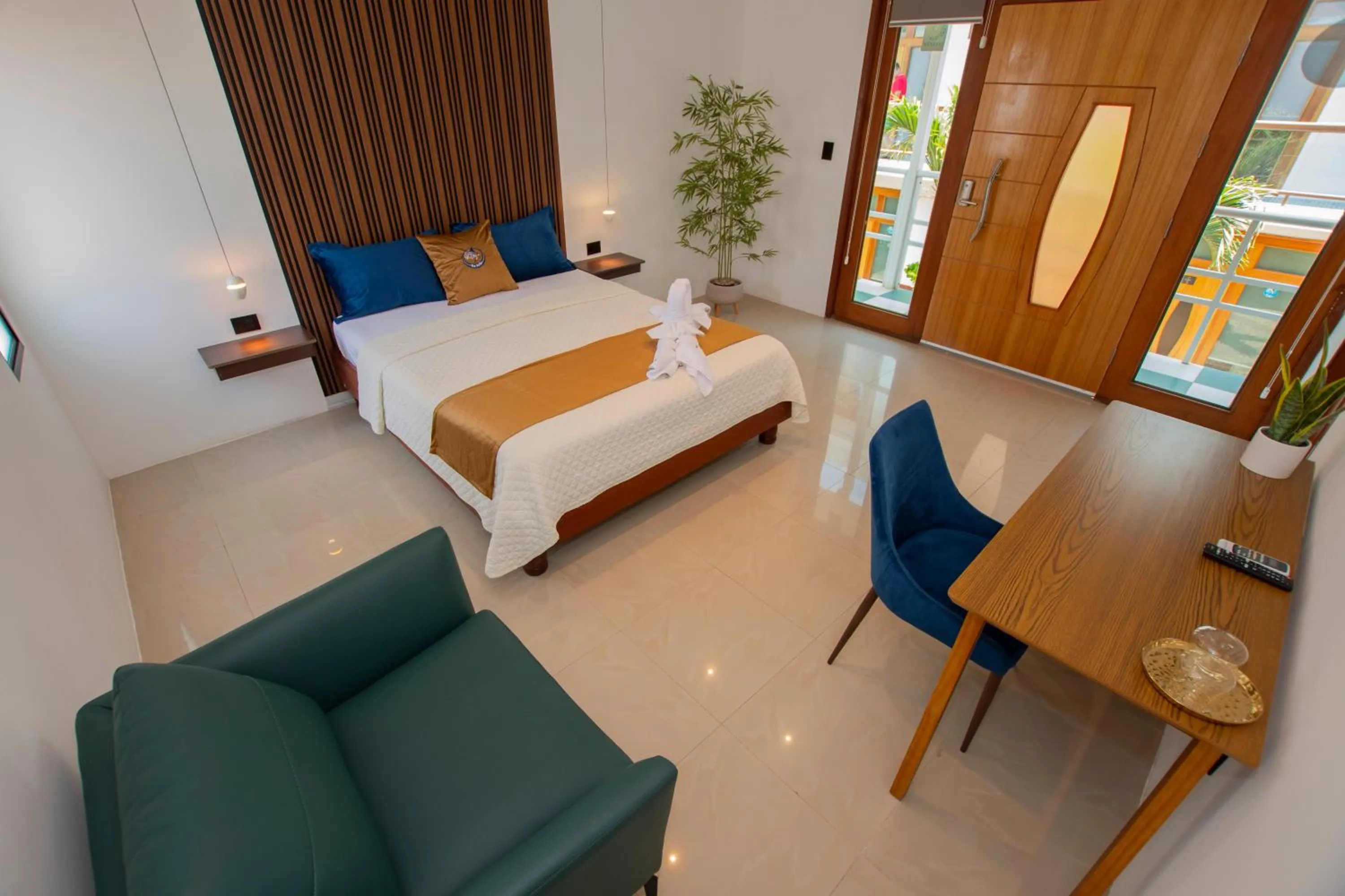 Bed in Blue Marlin Galápagos, Hotel & SPA