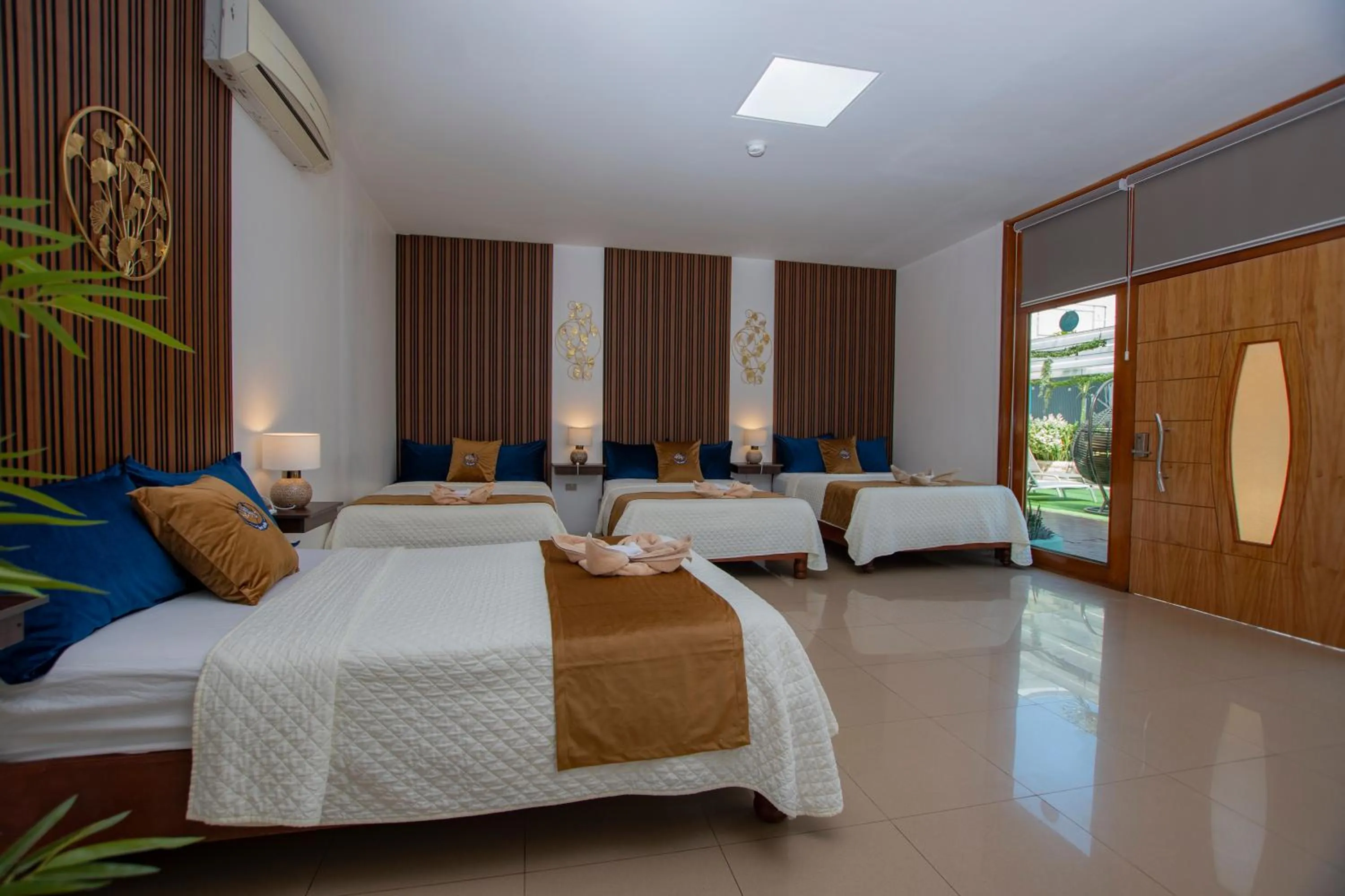 Bed in Blue Marlin Galápagos, Hotel & SPA