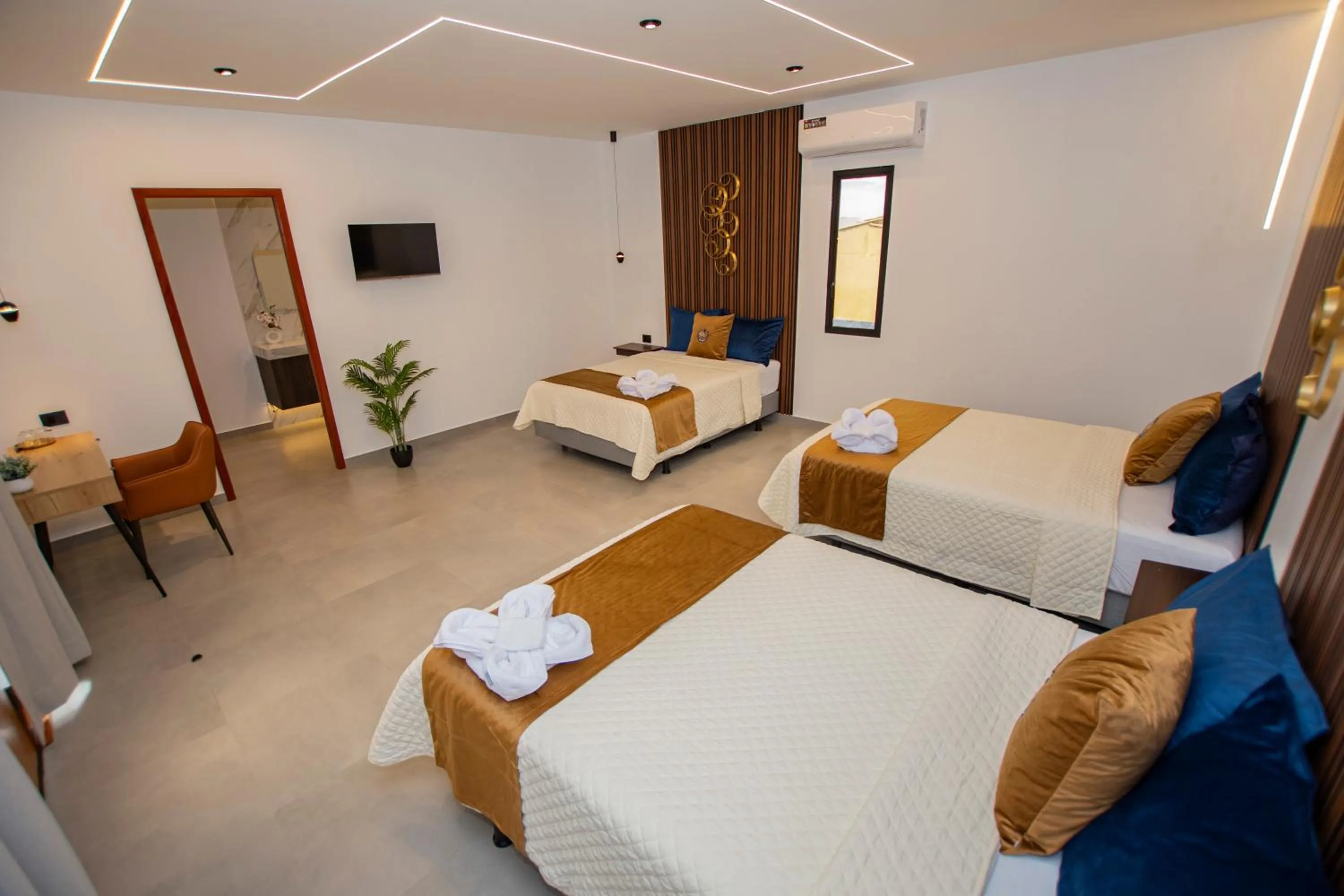 Bed in Blue Marlin Galápagos, Hotel & SPA