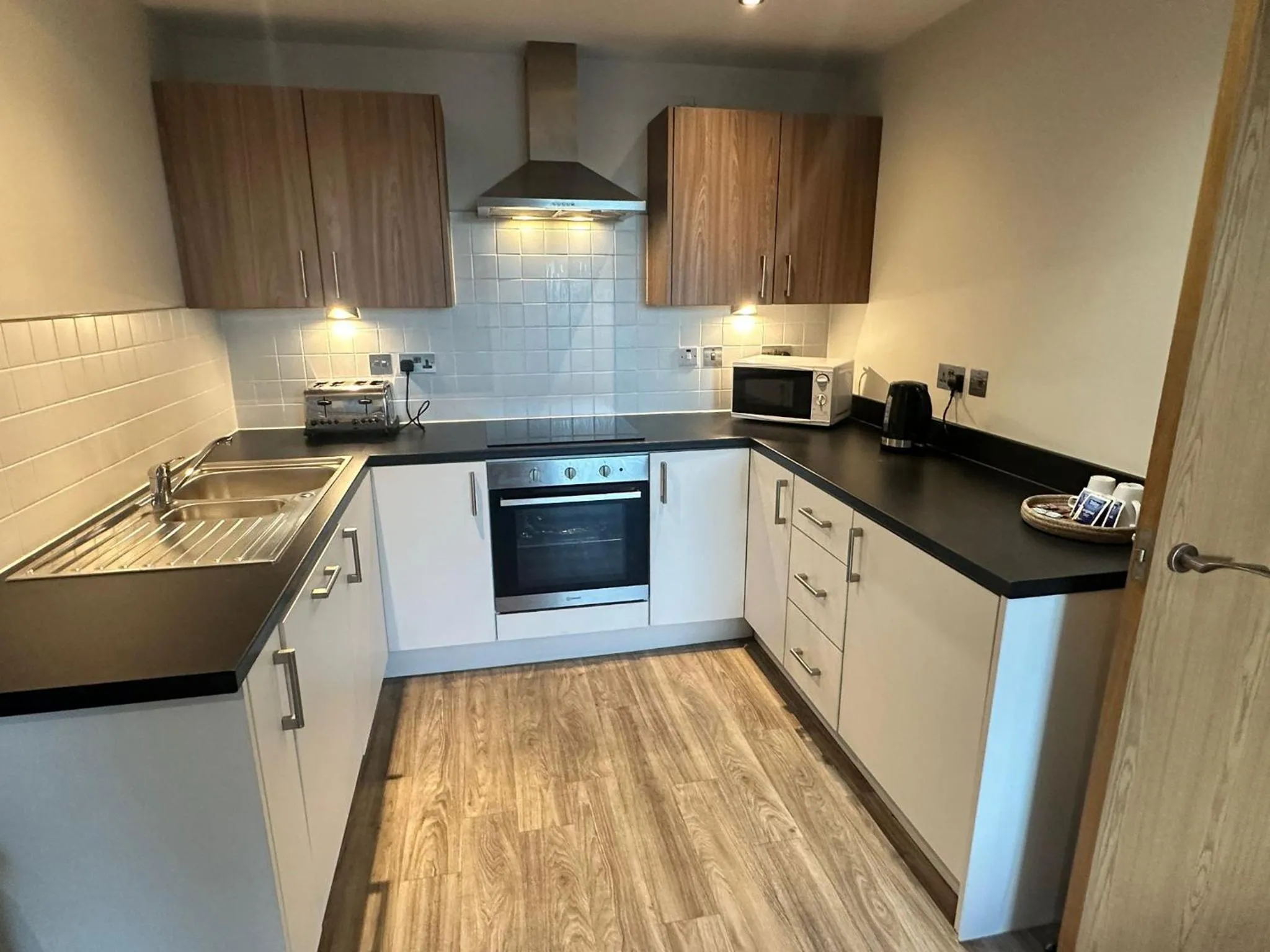 Kitchen or kitchenette in Obel Apartments by Beehosting