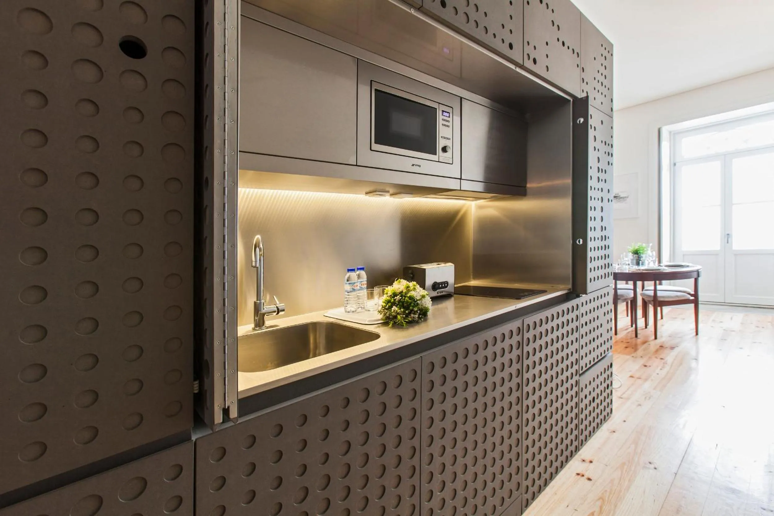 Kitchen or kitchenette in bnapartments Loftpuzzle