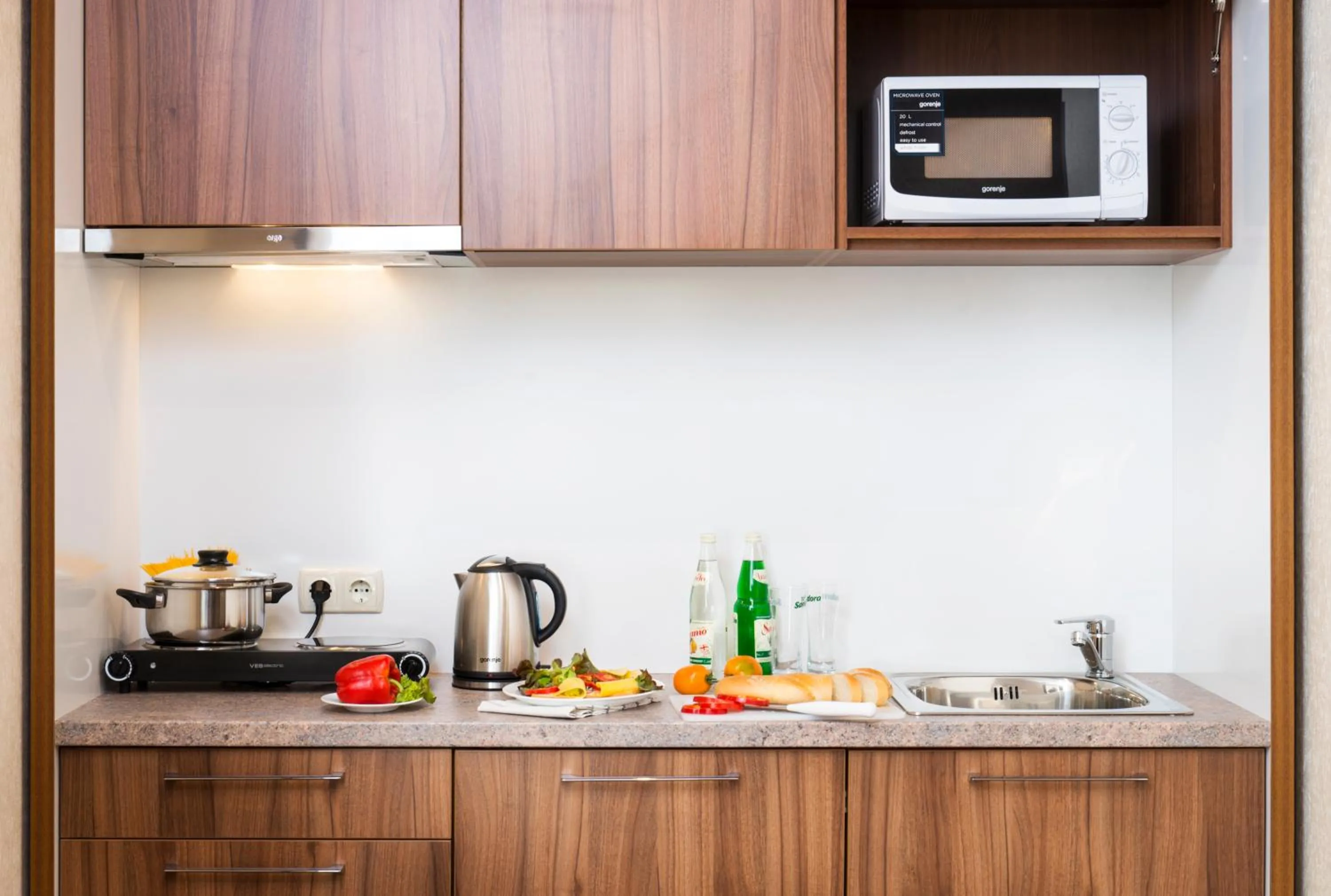 Kitchen or kitchenette in BonApart Hotel by UHM