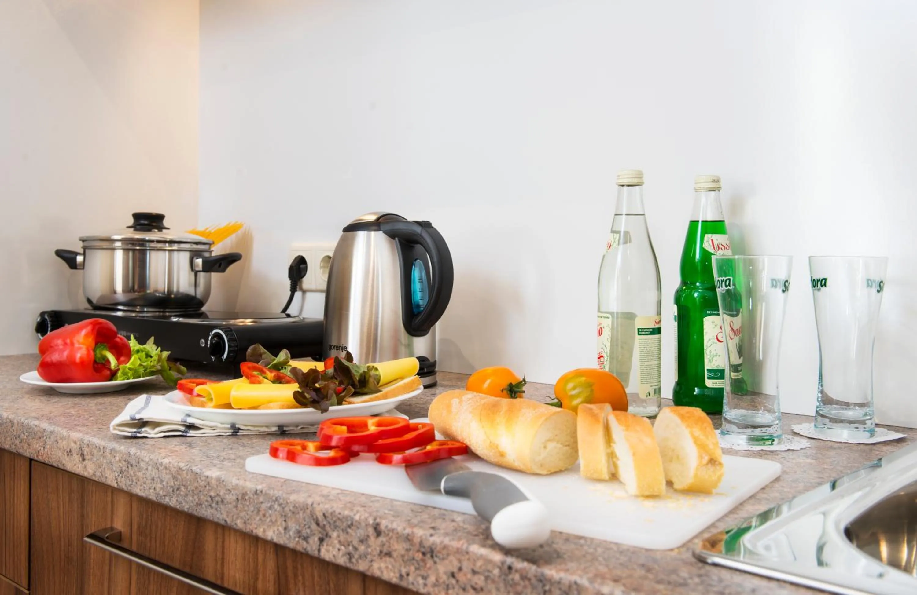 Kitchen or kitchenette in BonApart Hotel by UHM