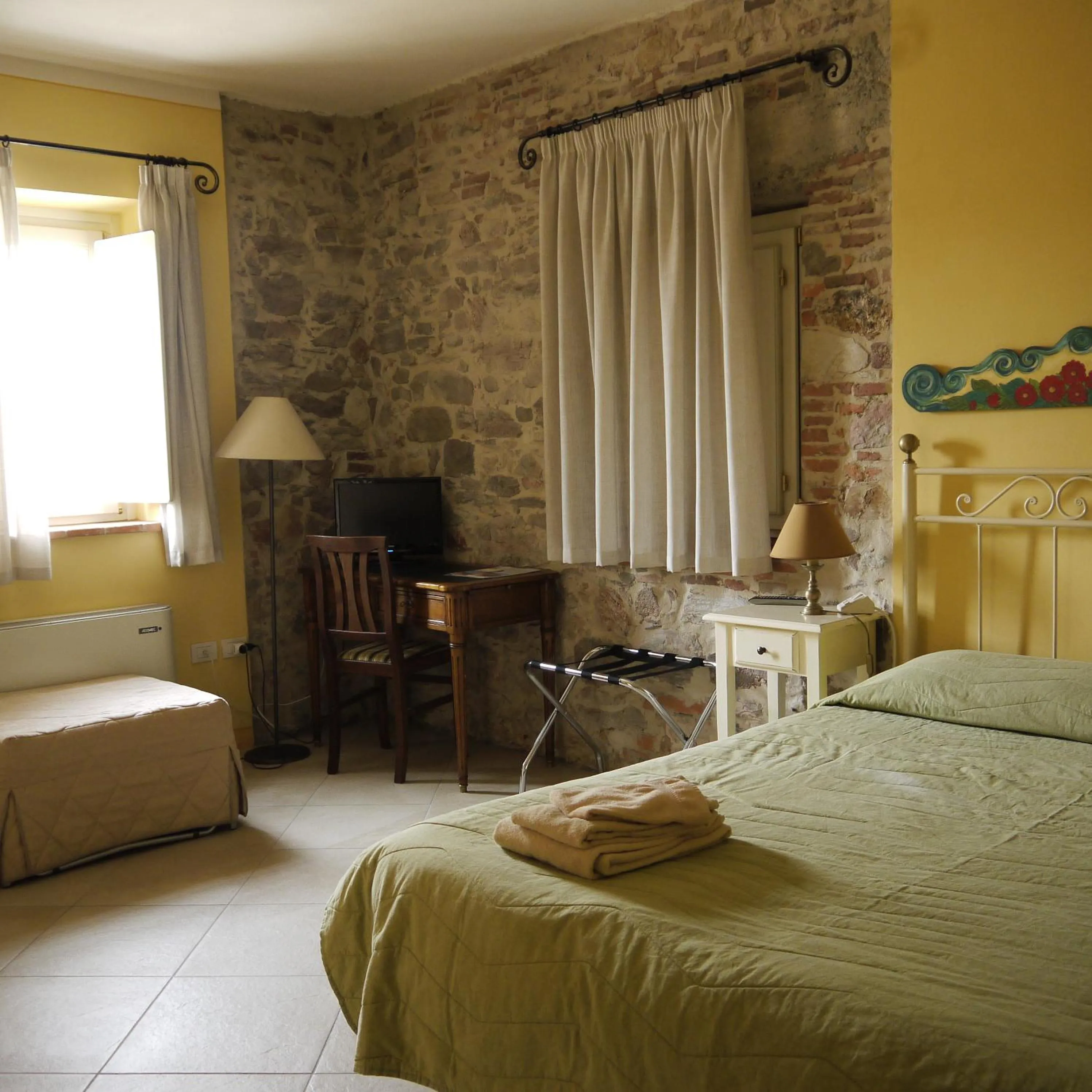 Photo of the whole room, Bed in Corte Capitani