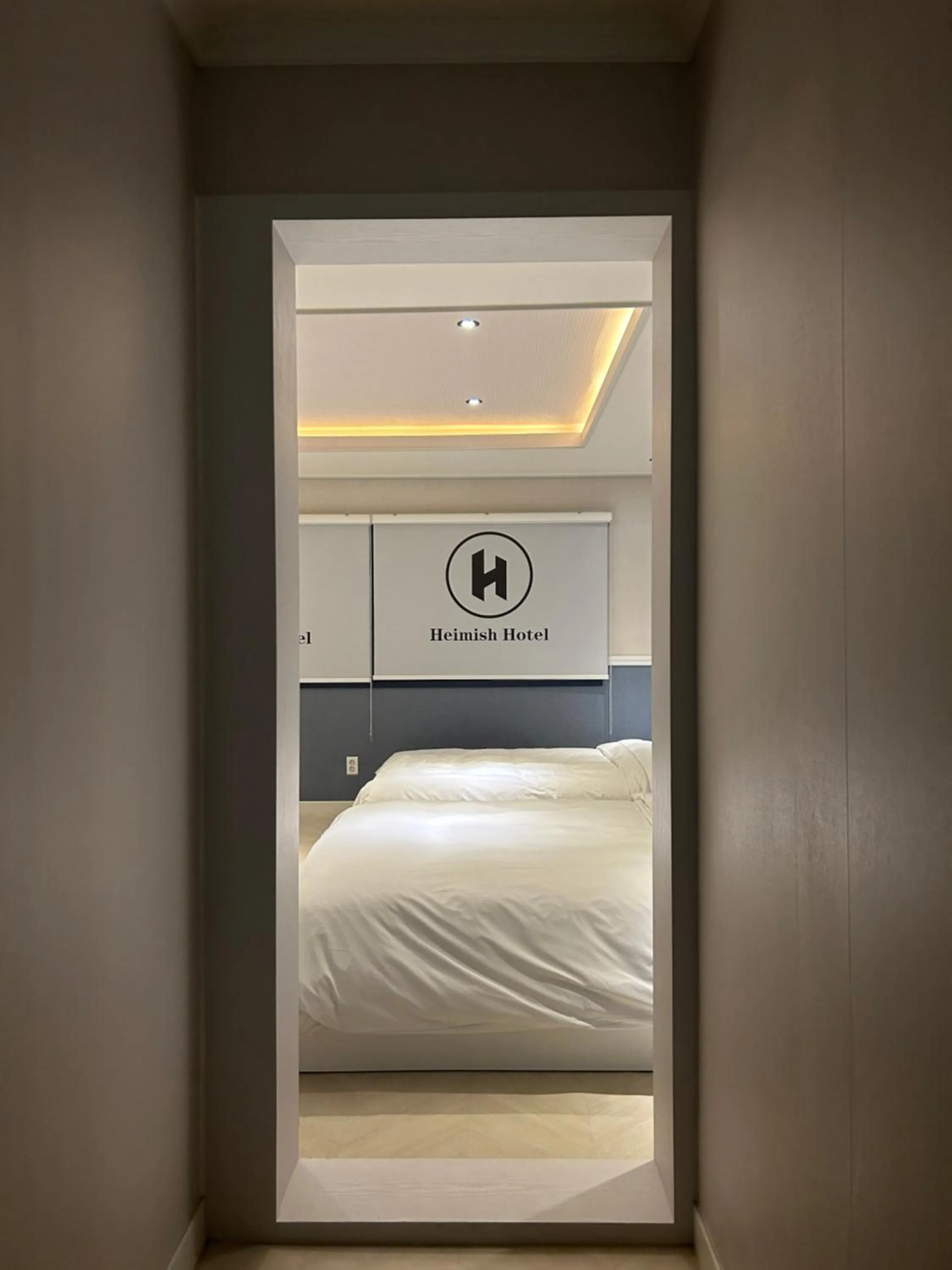 Bed in Heimish Hotel