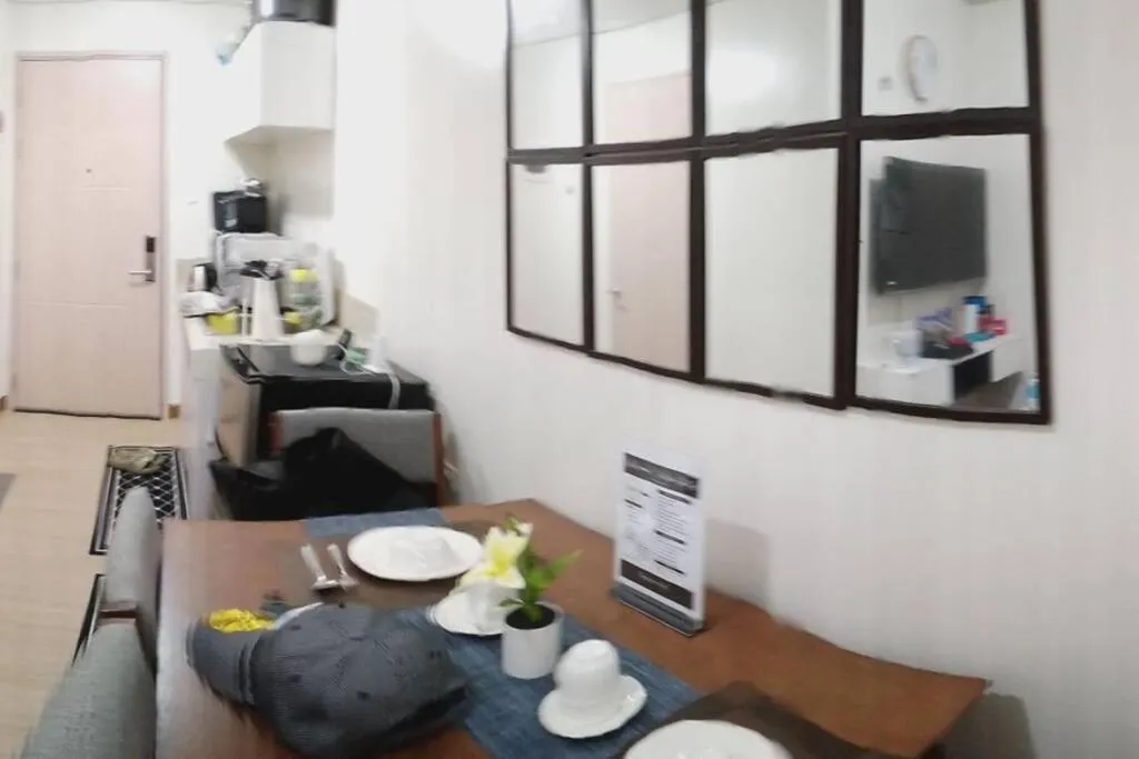 Seating area in Chelsea Suite's Esthetic Staycation at Trees Residence QC