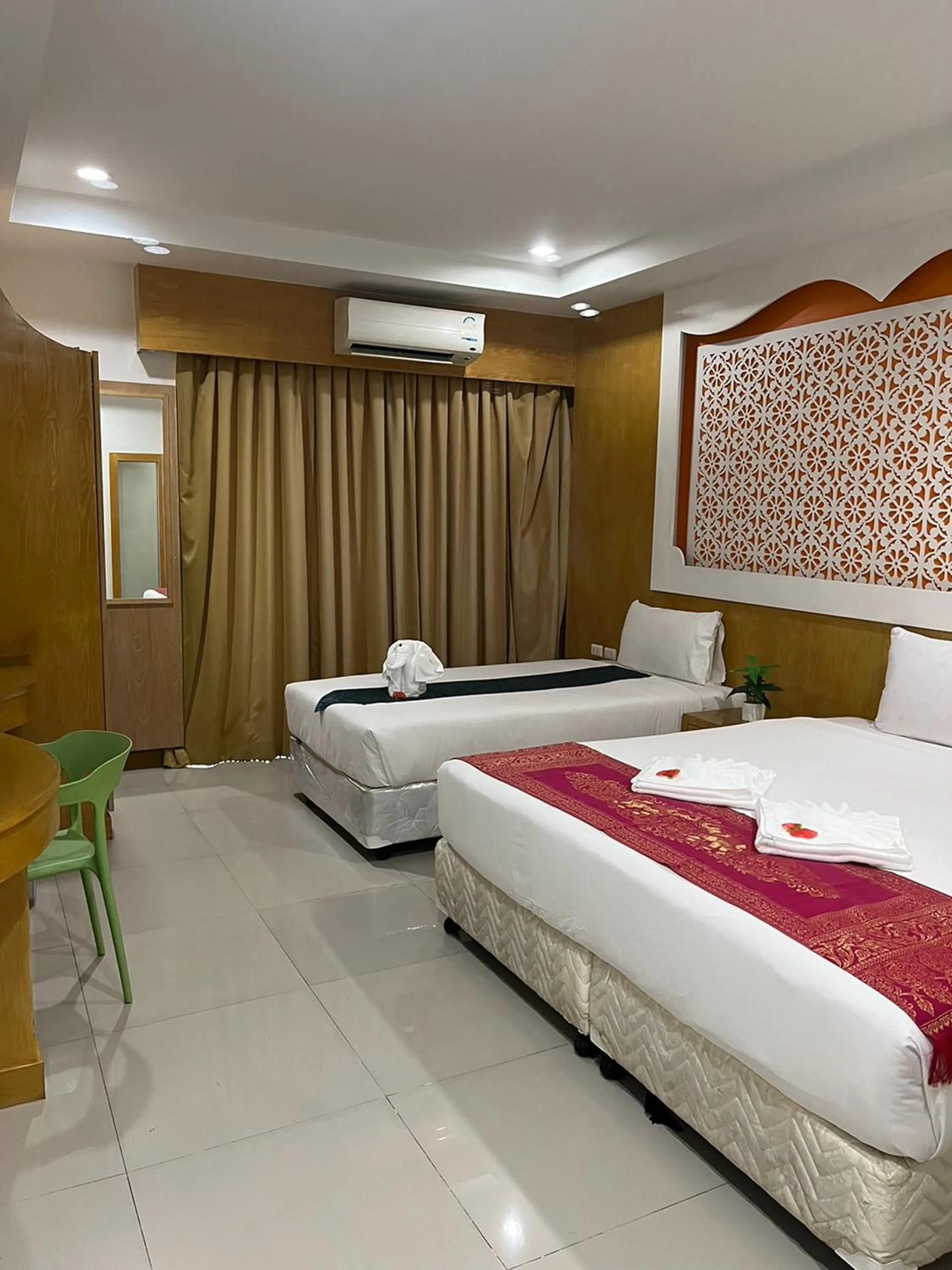 Bedroom, Bed in T & C Hotel Patong Beach