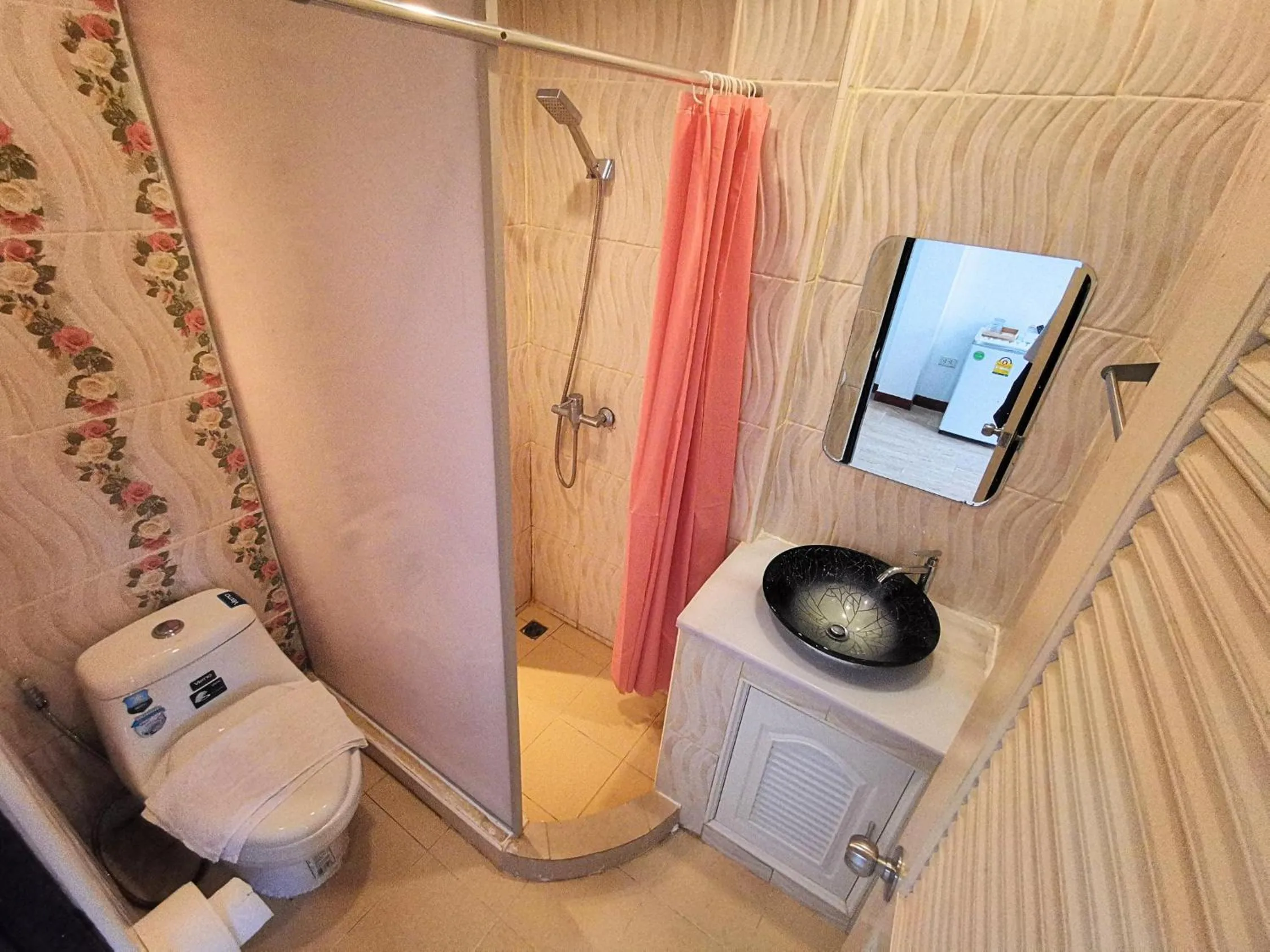 Bed in Kan Home Hotel