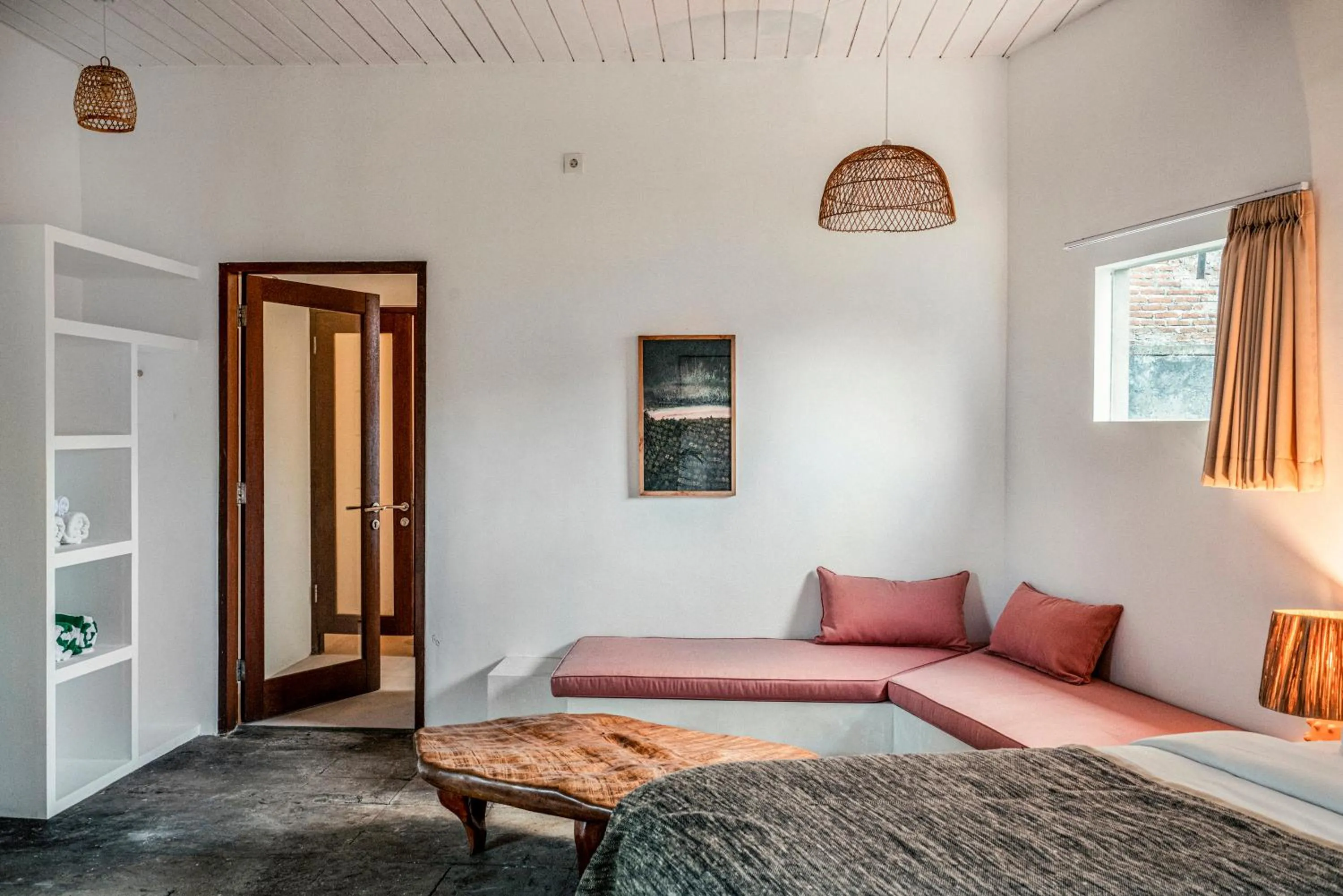 Seating area, Bed in Batu Belig Living by CPM Bali