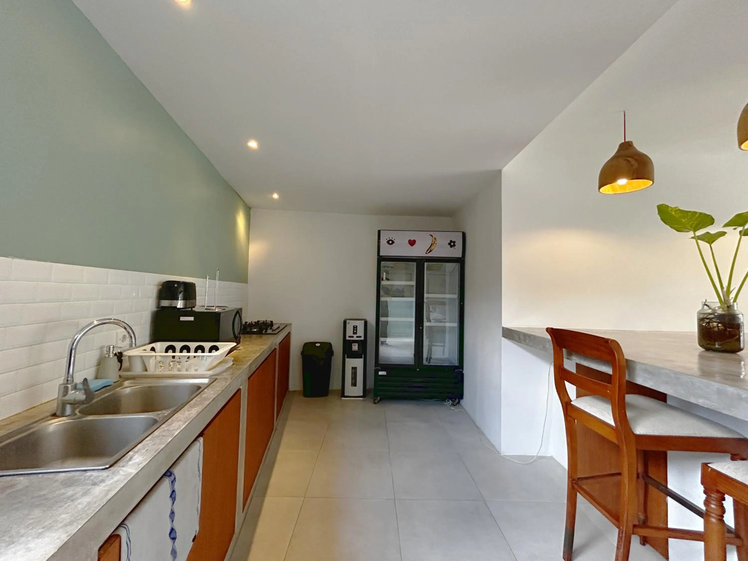 kitchen in Batu Belig Living by CPM Bali