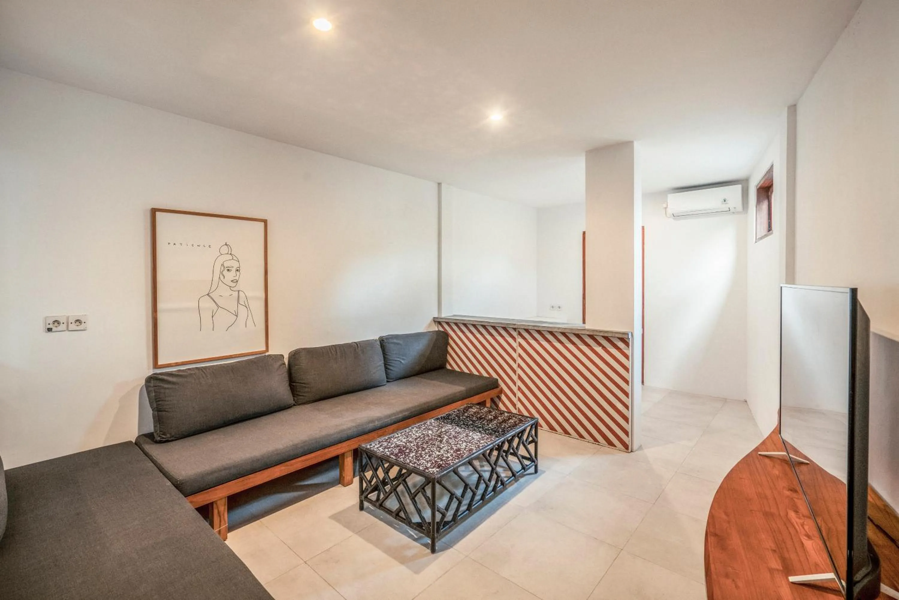 Living room in Batu Belig Living by CPM Bali