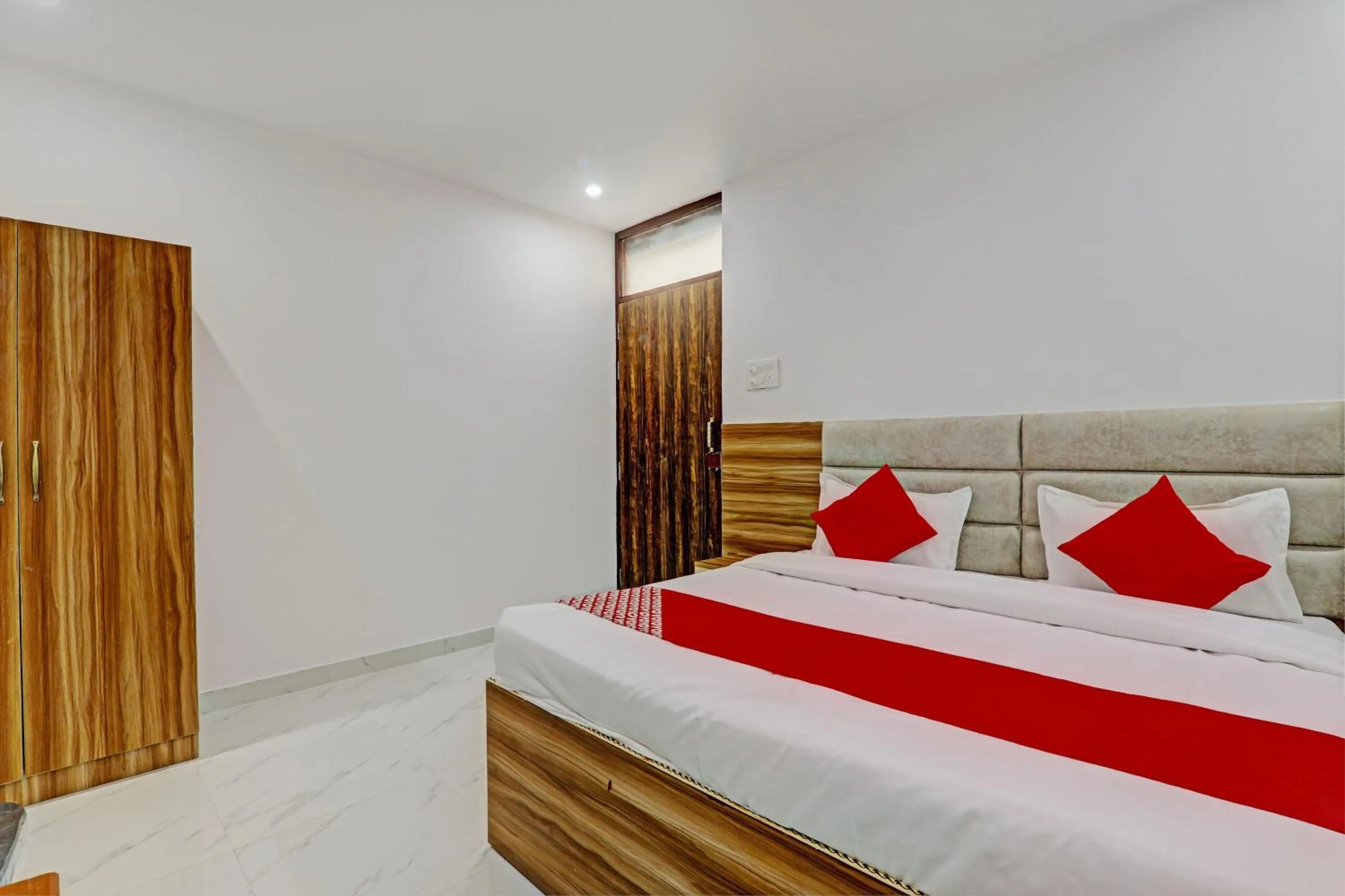 Bedroom in Super Hotel O Raghav & Banquet