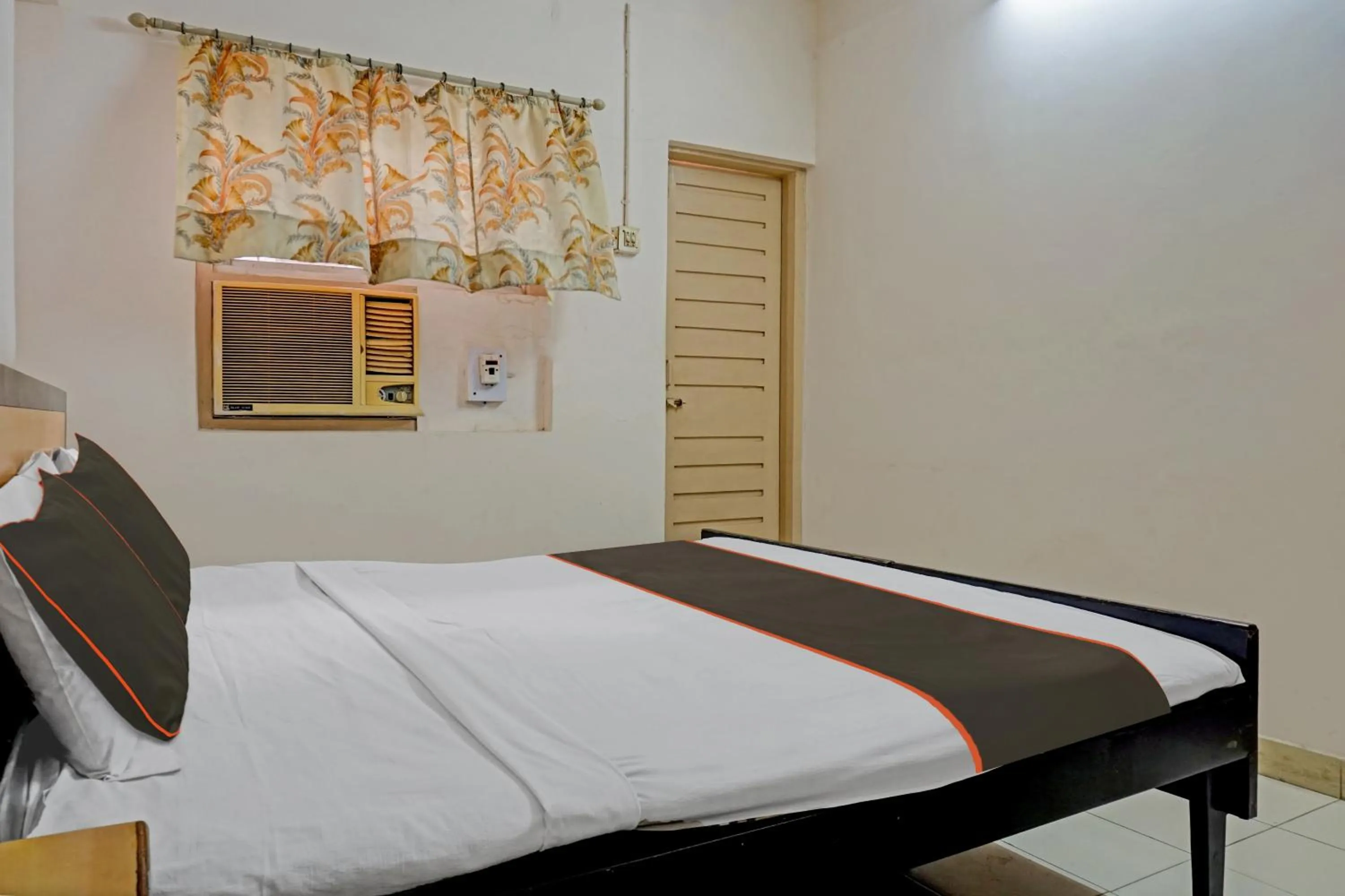 Bedroom in Hotel O Thakkar Lodge