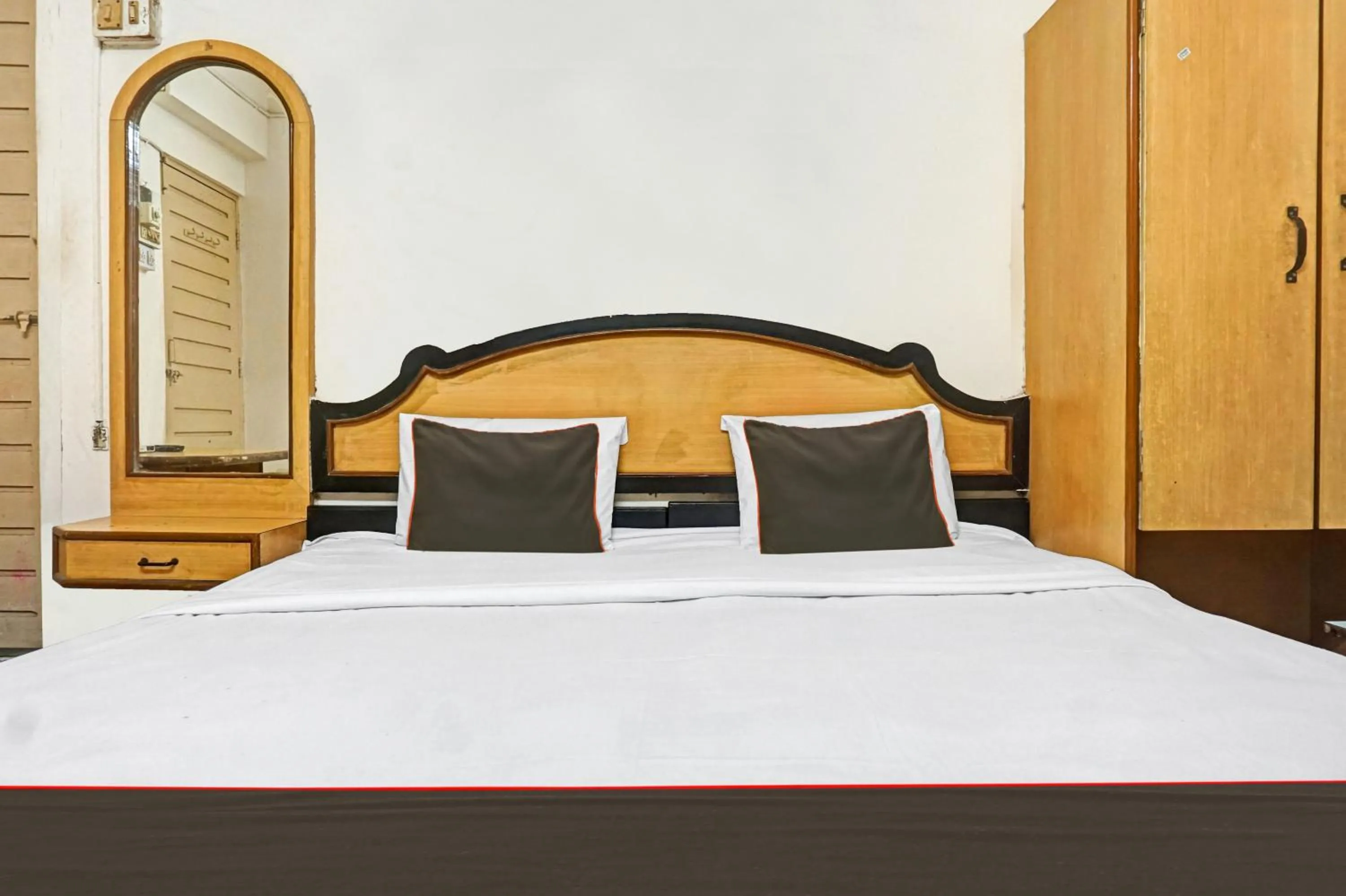 Bedroom in Hotel O Thakkar Lodge