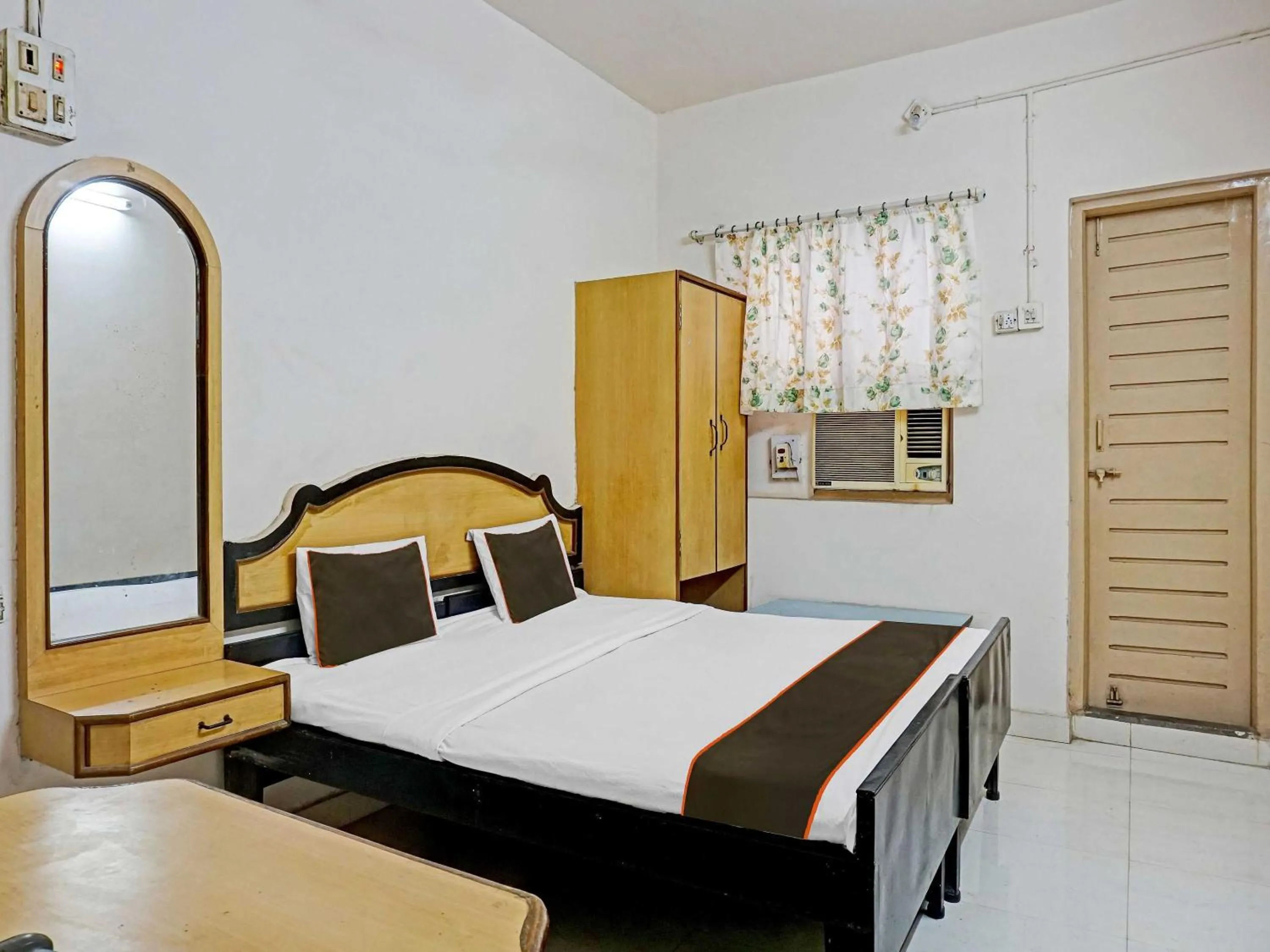 Bedroom in Hotel O Thakkar Lodge