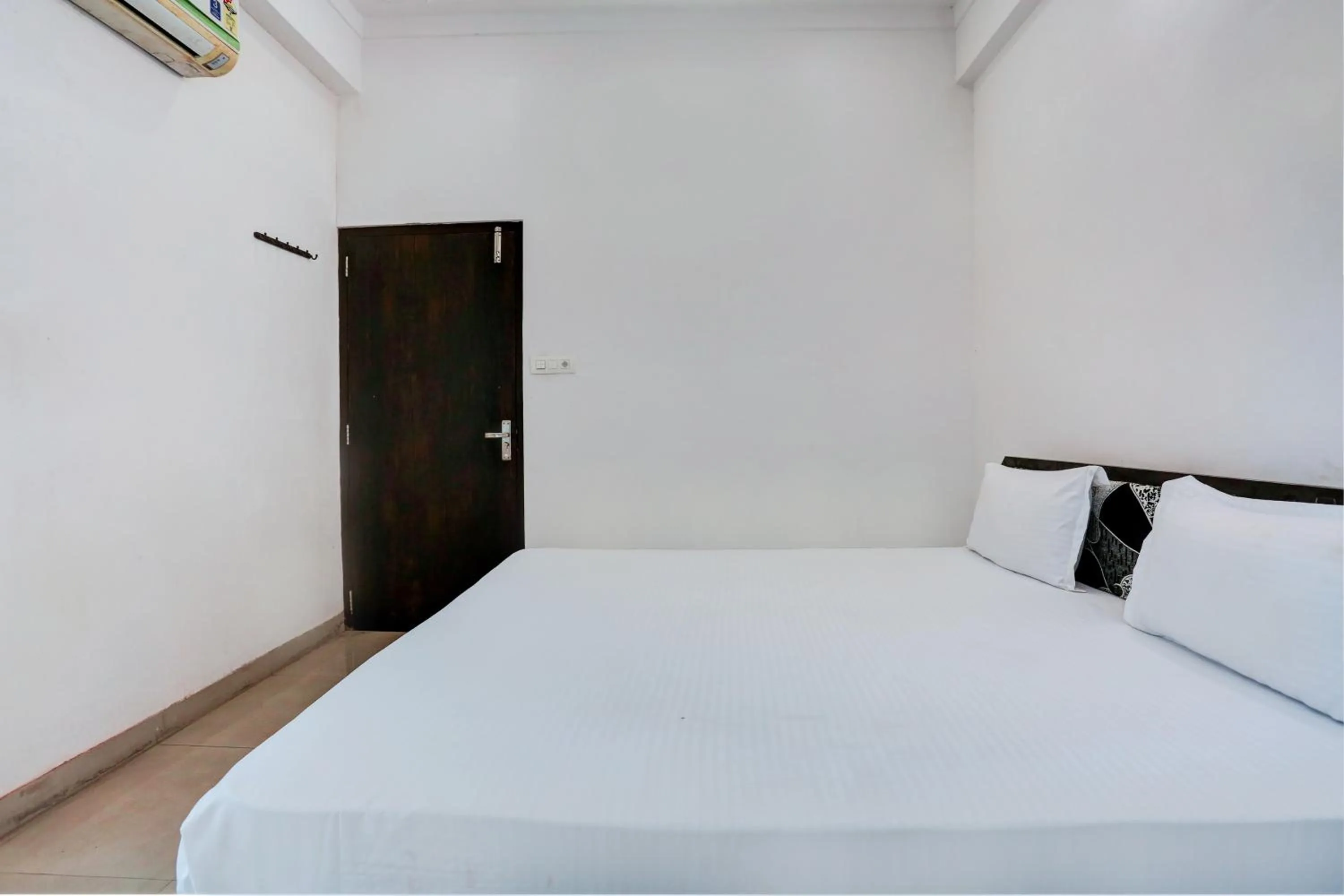 Bedroom in Super Hotel O Goverdhan Villa