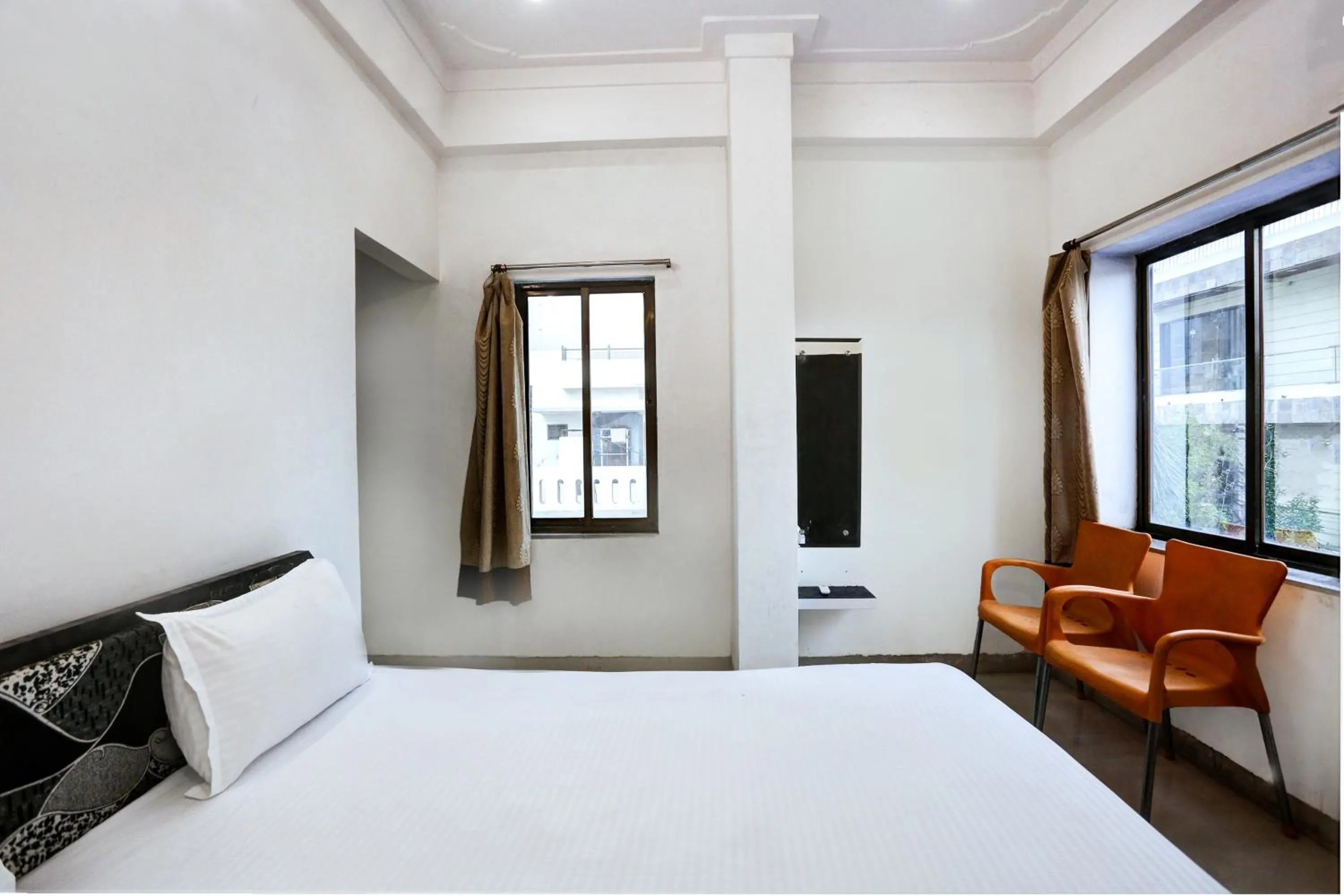 Bedroom in Super Hotel O Goverdhan Villa