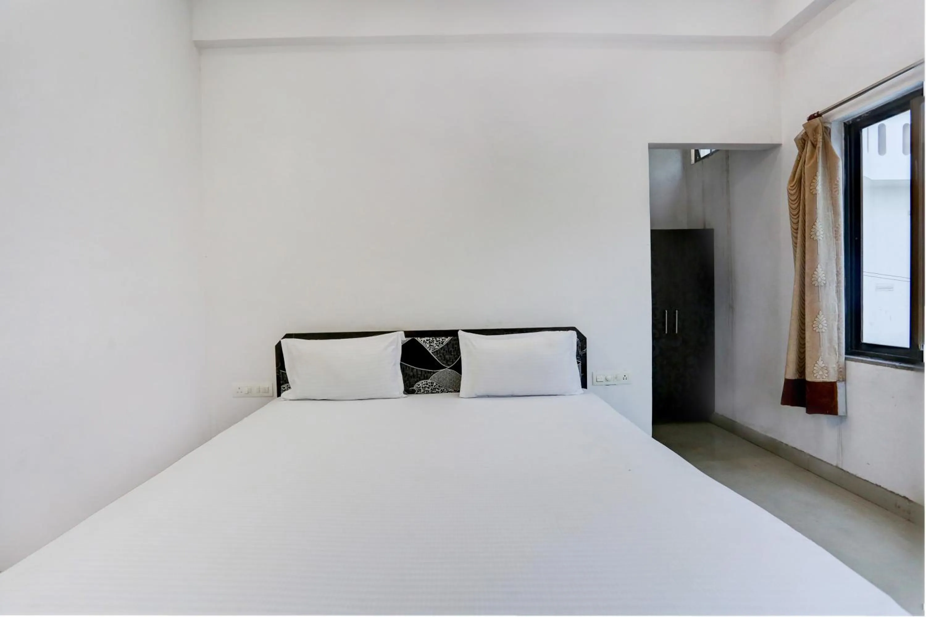 Bedroom in Super Hotel O Goverdhan Villa