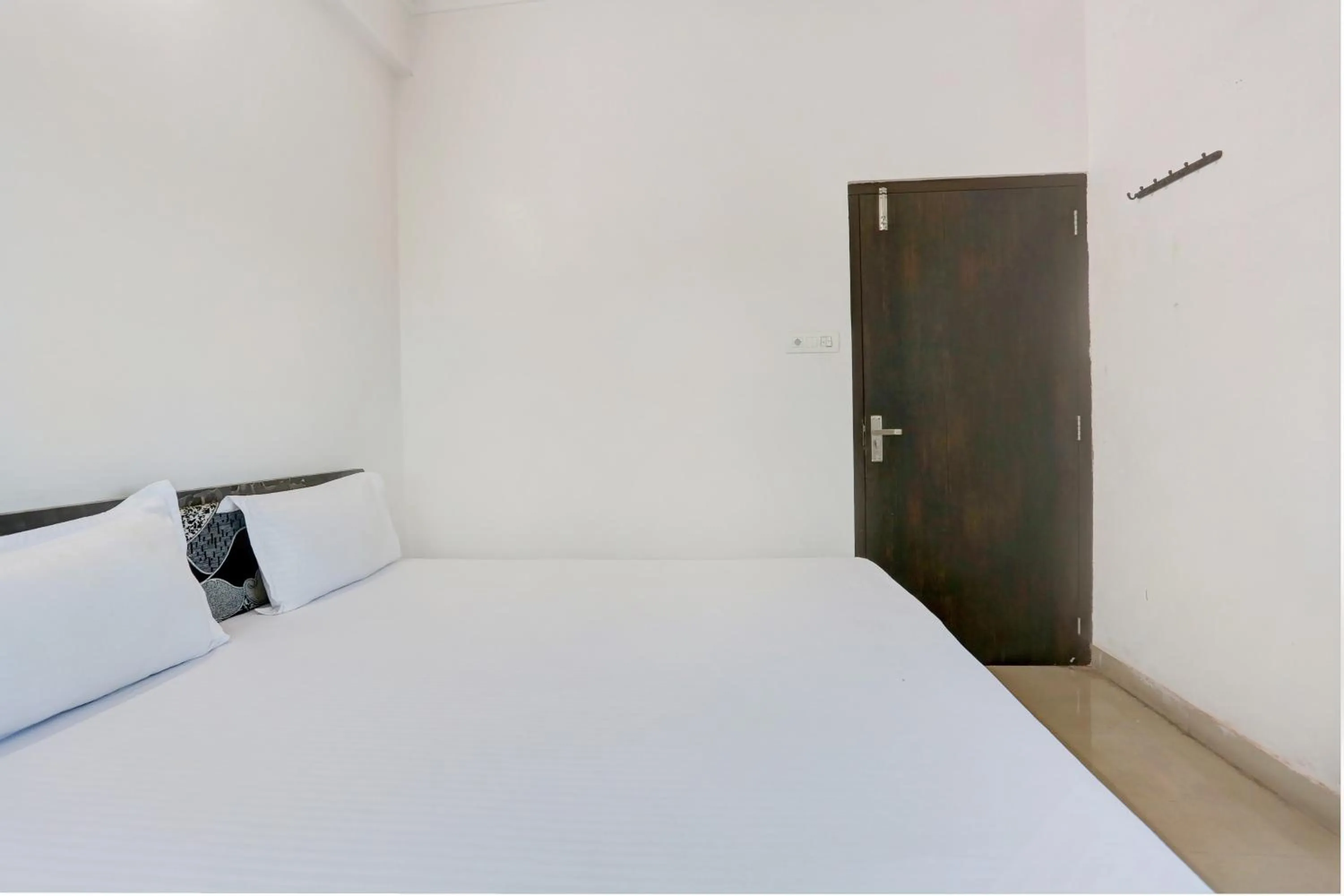 Bedroom in Super Hotel O Goverdhan Villa