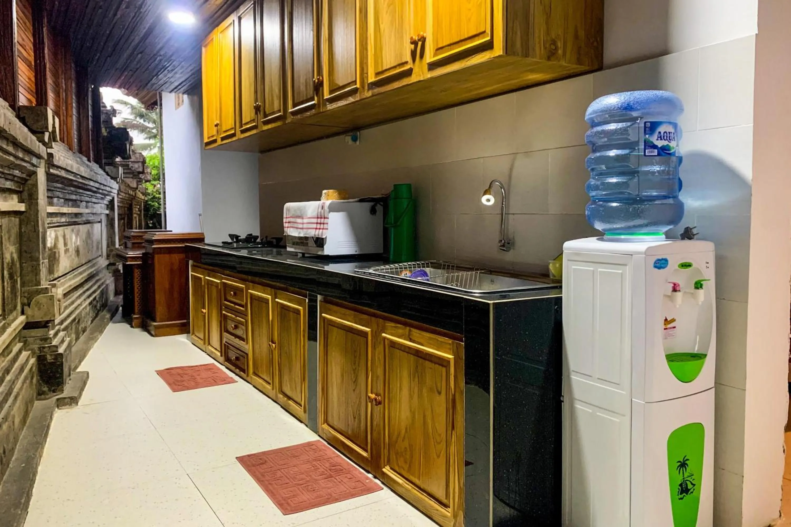 Kitchen or kitchenette in Alam Desa Homestay by AGATA