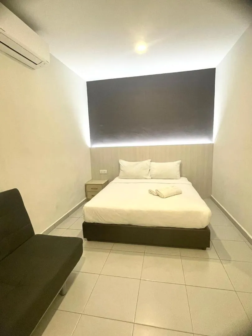 Bed in Garden Inns Motel