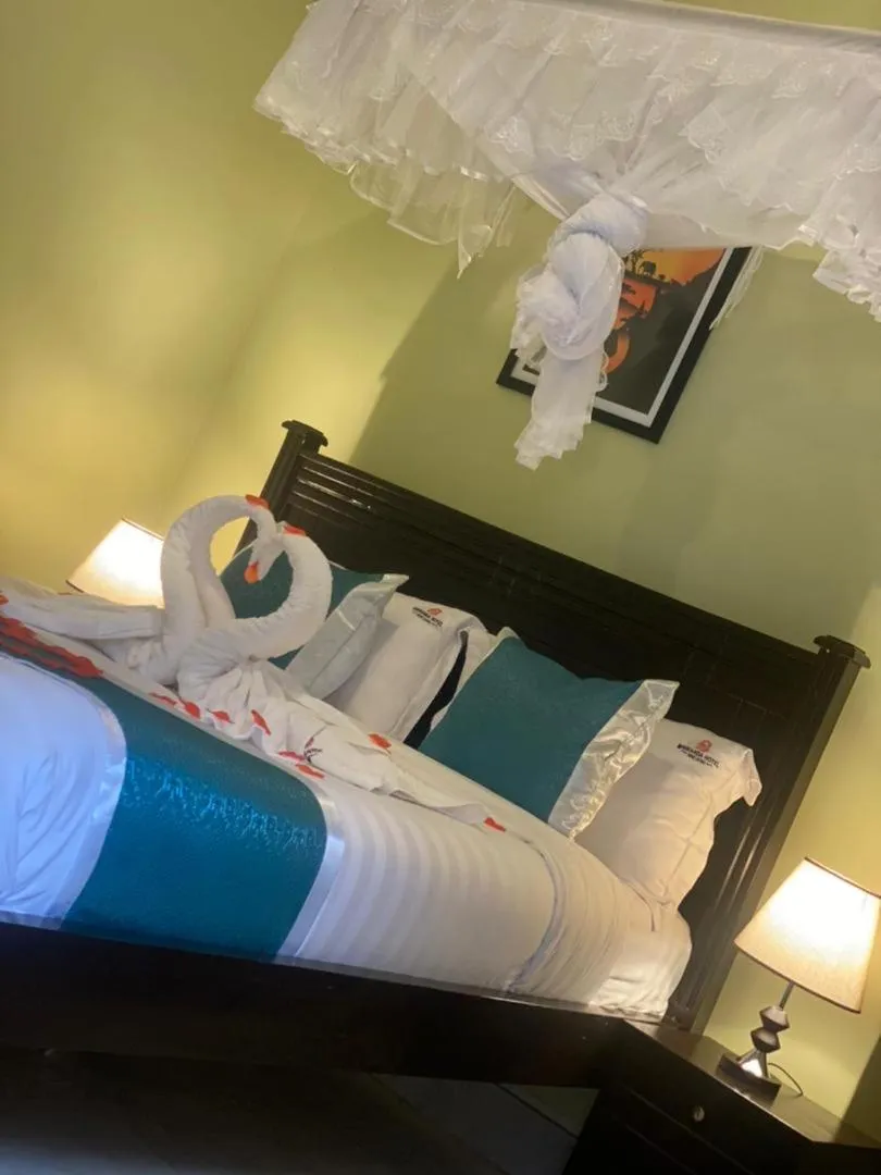 Bed in BWIRANDA HOTEL