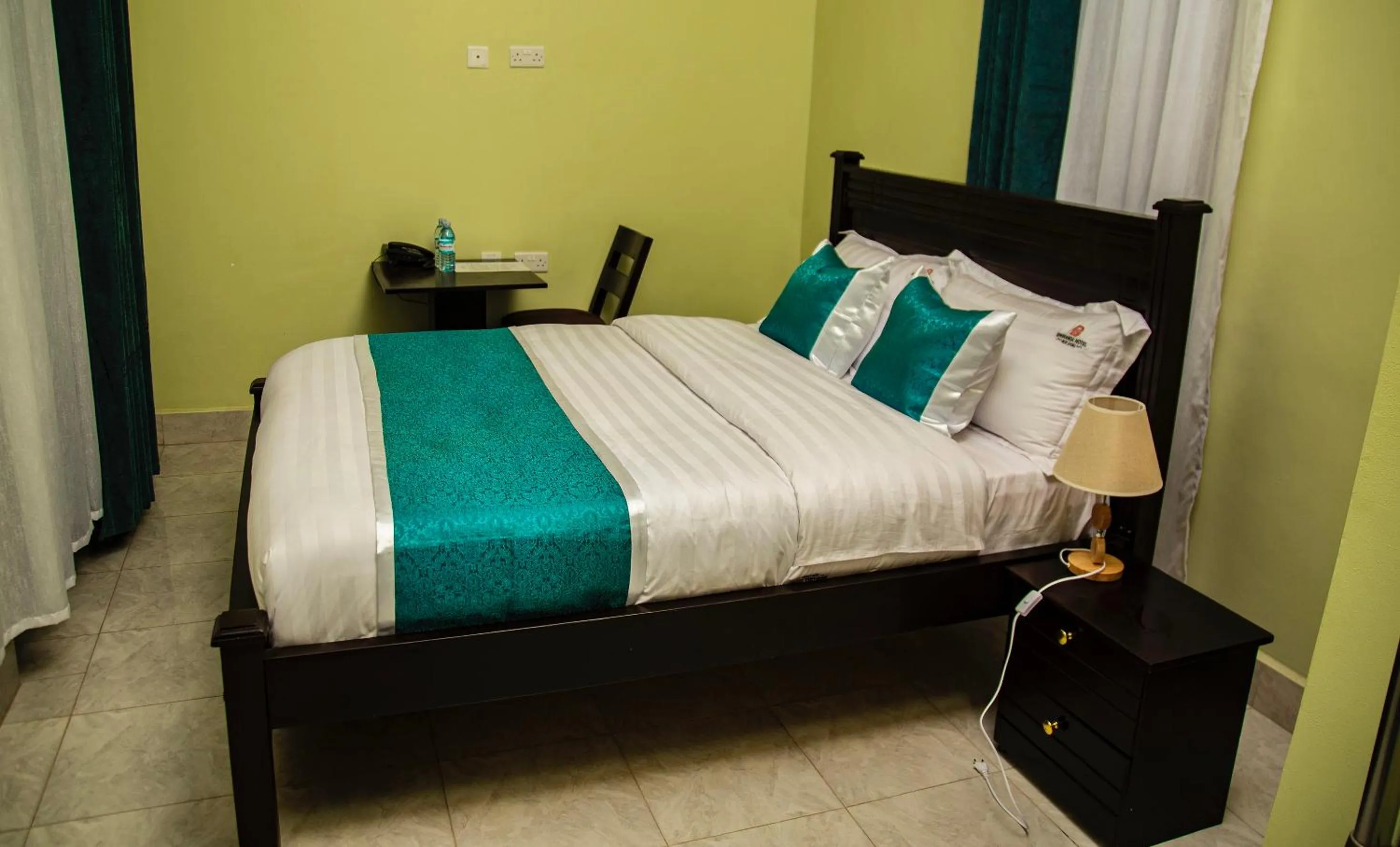 Bed in BWIRANDA HOTEL