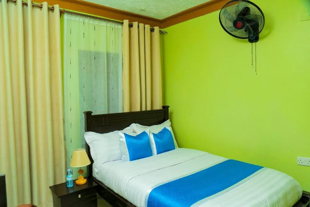 Bed in BWIRANDA HOTEL