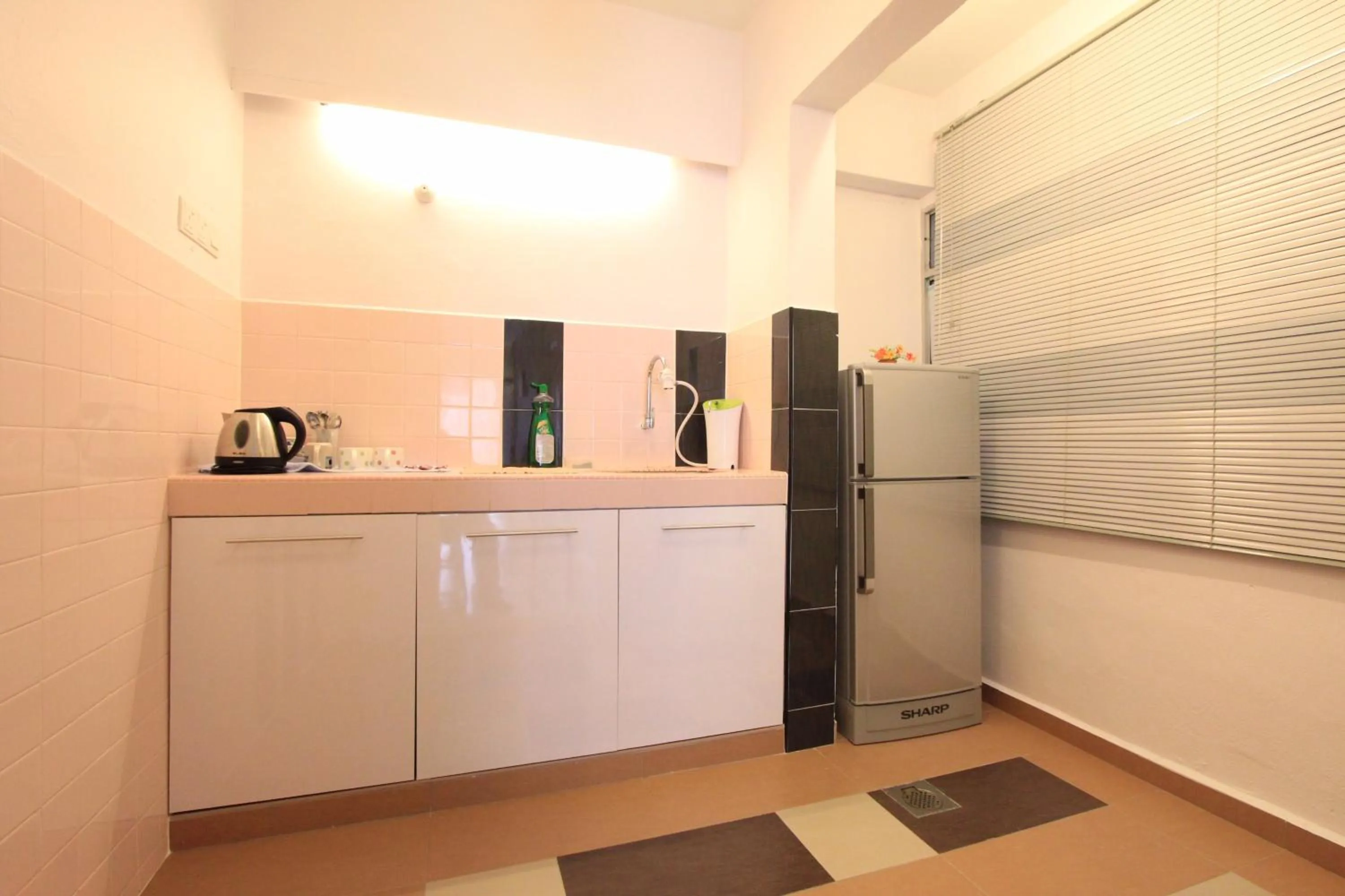 Kitchen or kitchenette in Cosy Stay Melaka