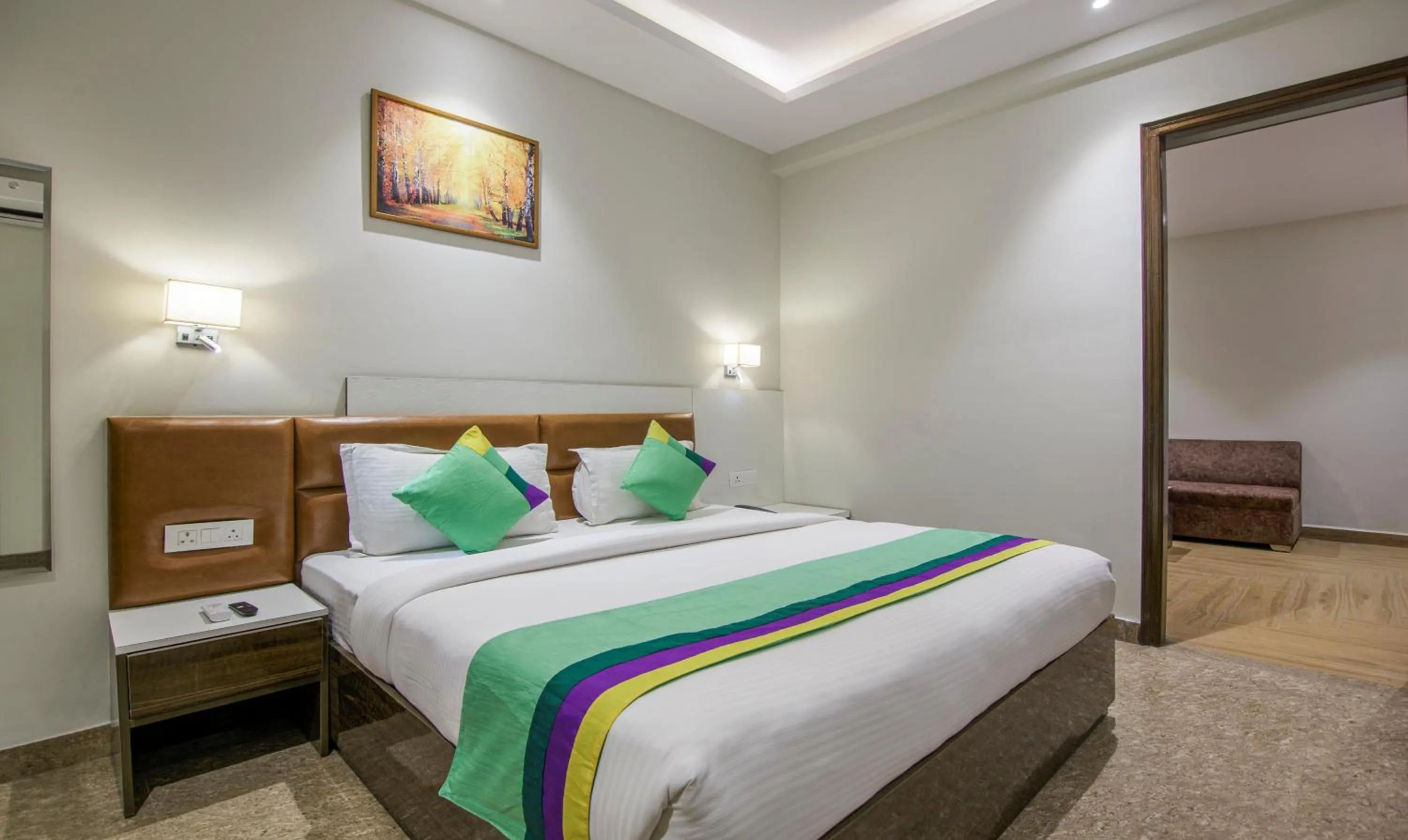 Bed in Treebo Swastika Premium