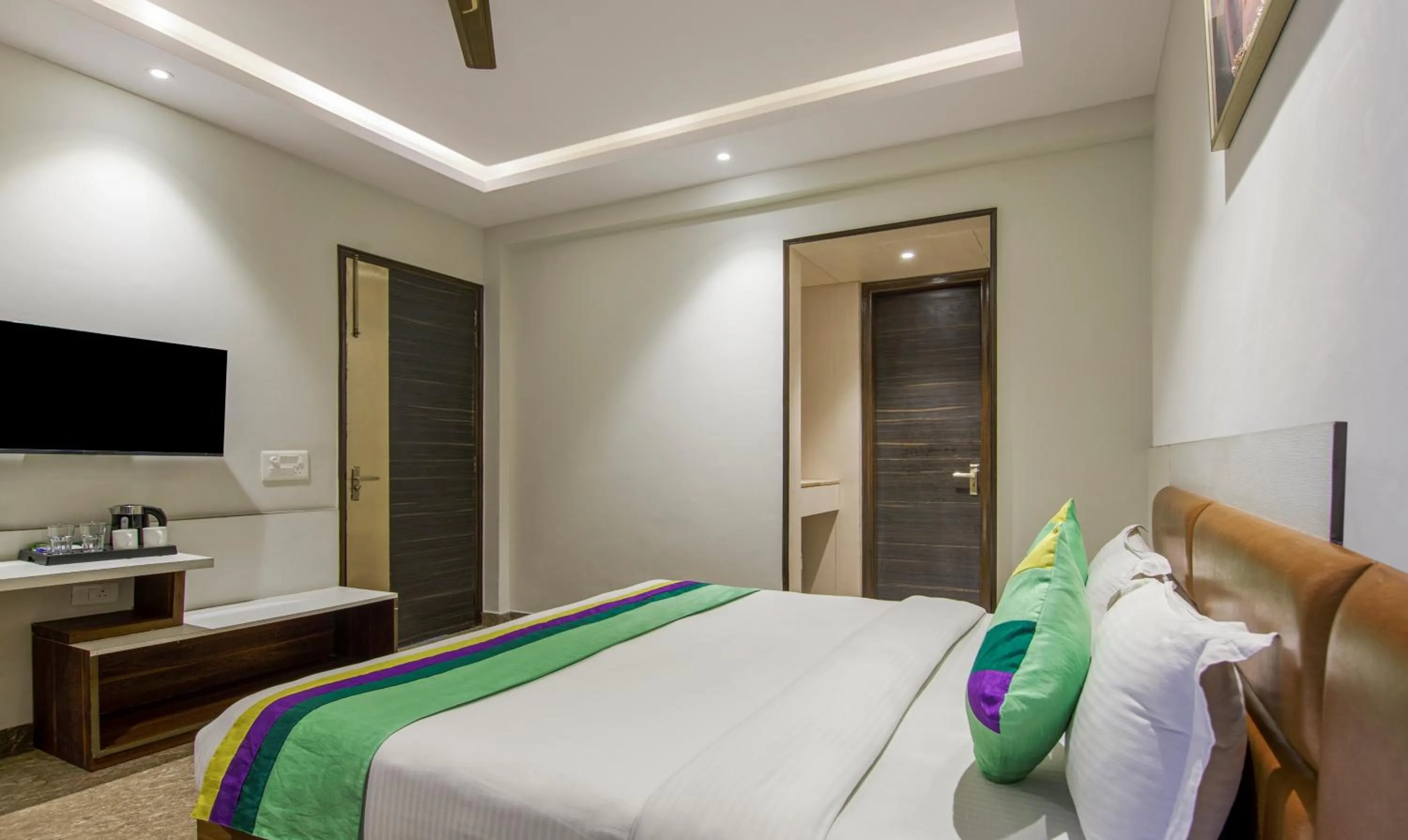 Bed in Treebo Swastika Premium