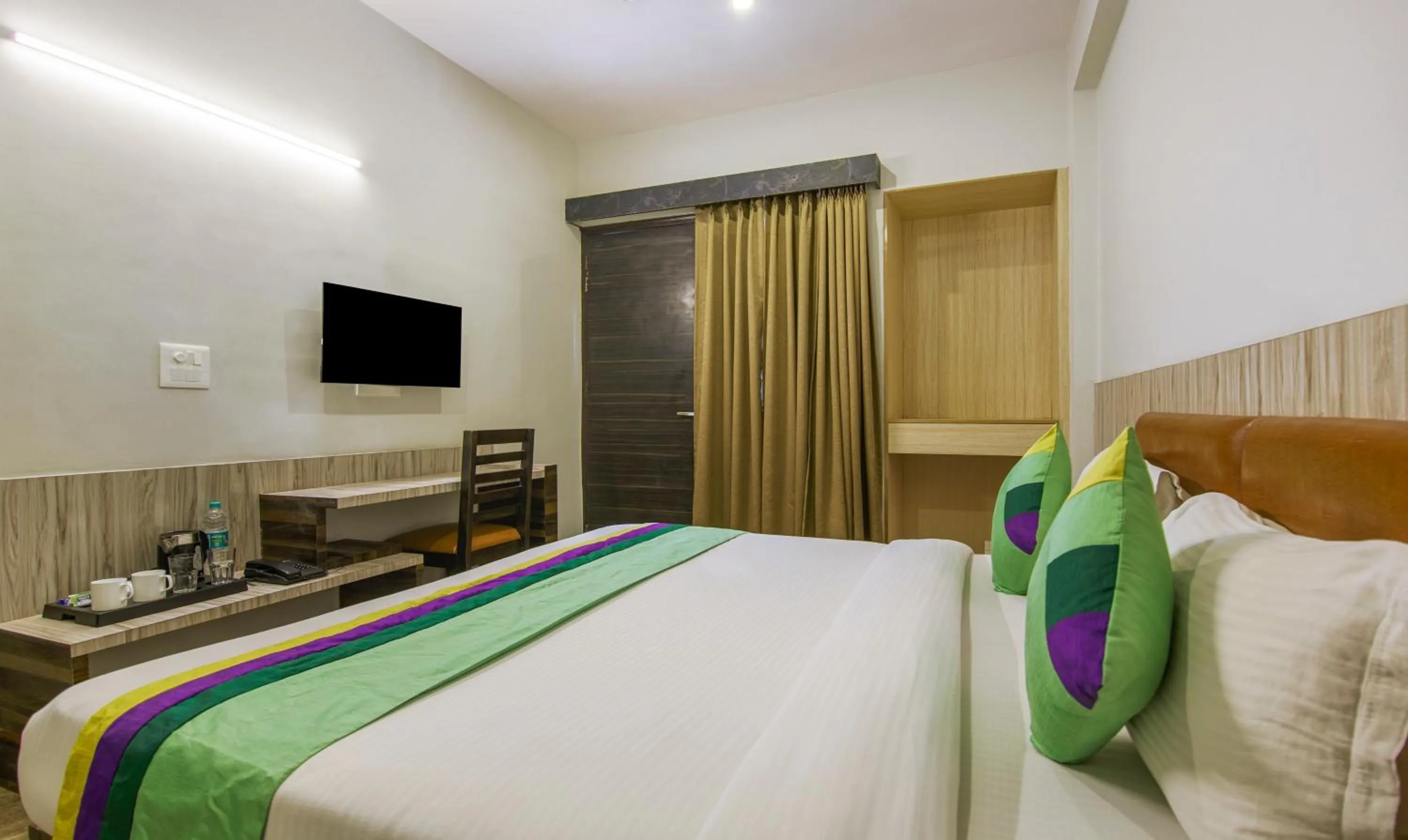 Bed in Treebo Swastika Premium